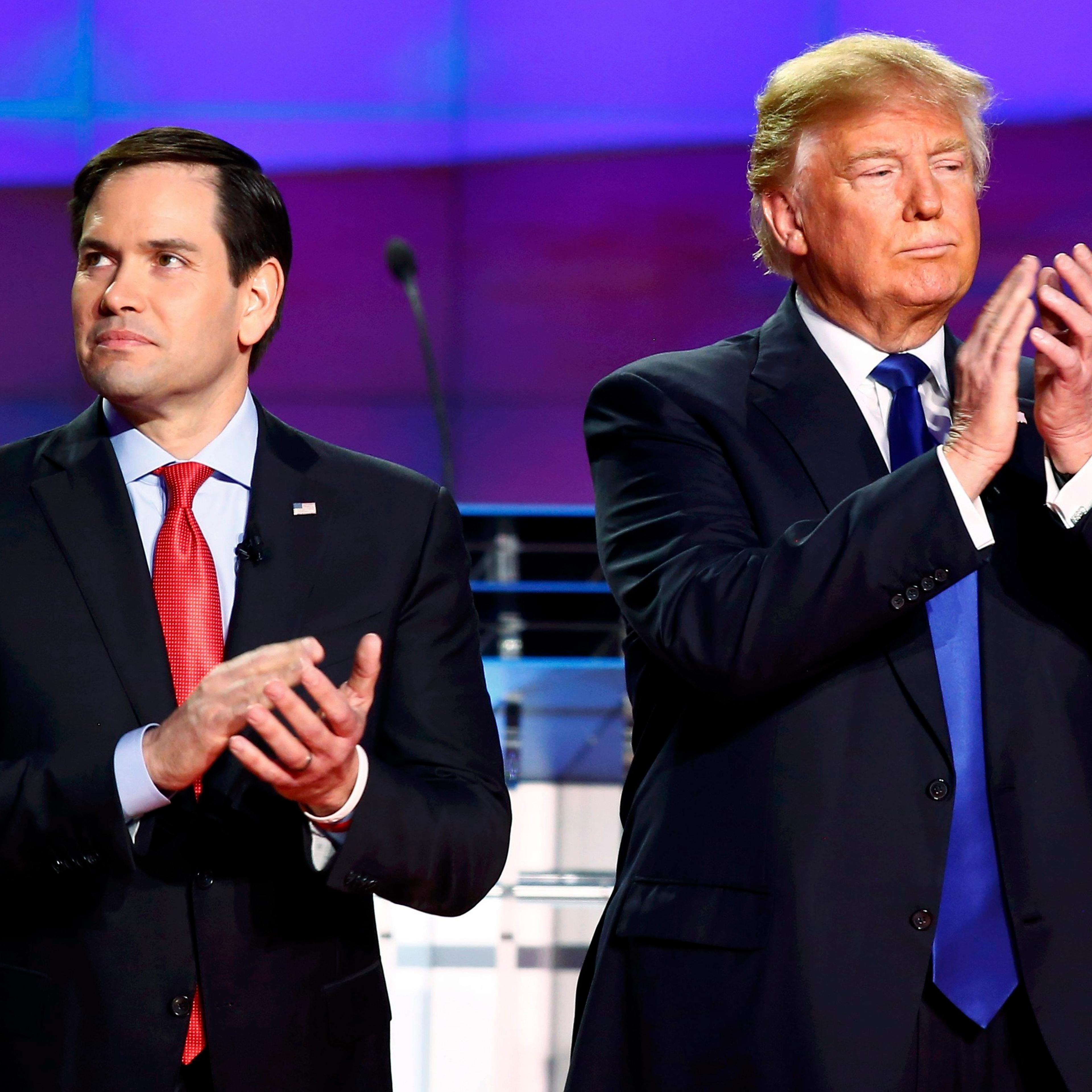 Republican presidential candidates Florida Sen. Marco Rubio and businessman Donald Trump participate in a GOP debate in Houston on Feb. 25, 2016.