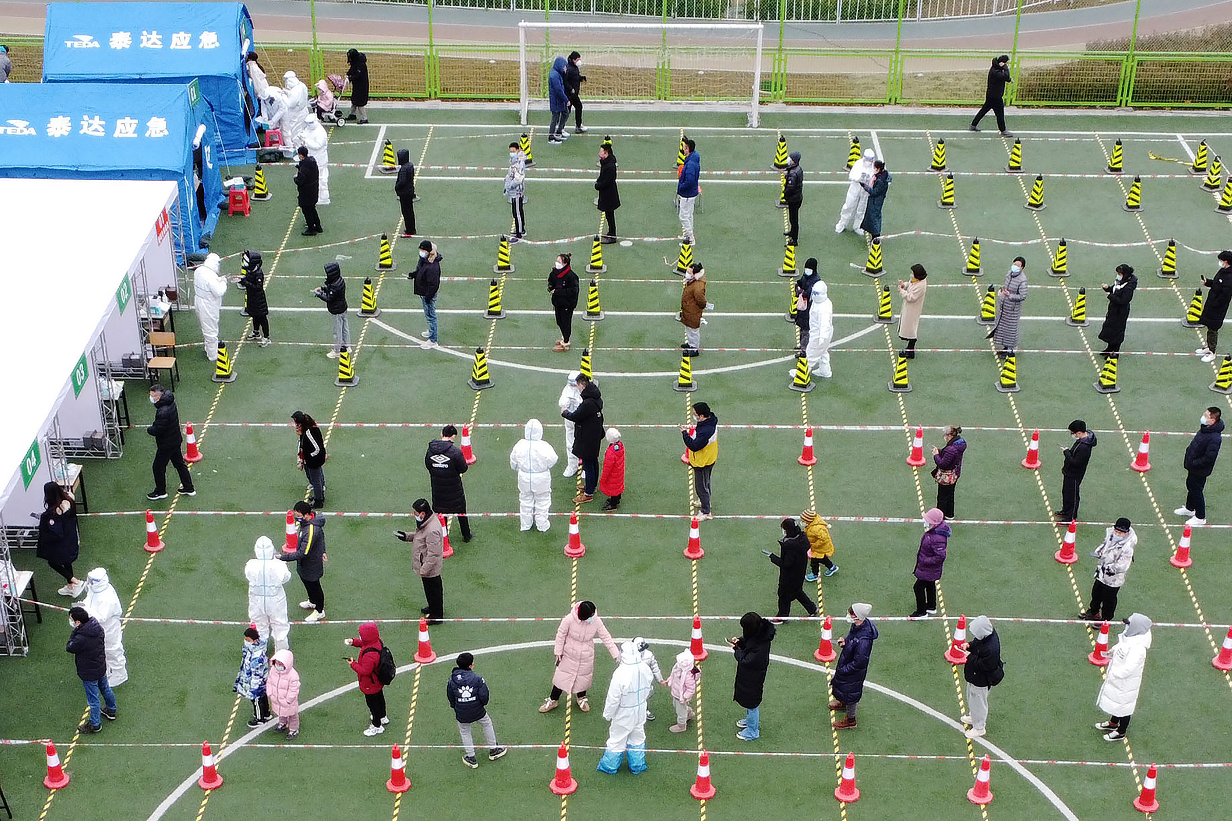 Residents line up for ­COVID-19 testing in China’s Tianjin Municipality, just weeks before the Beijing Winter Olympics