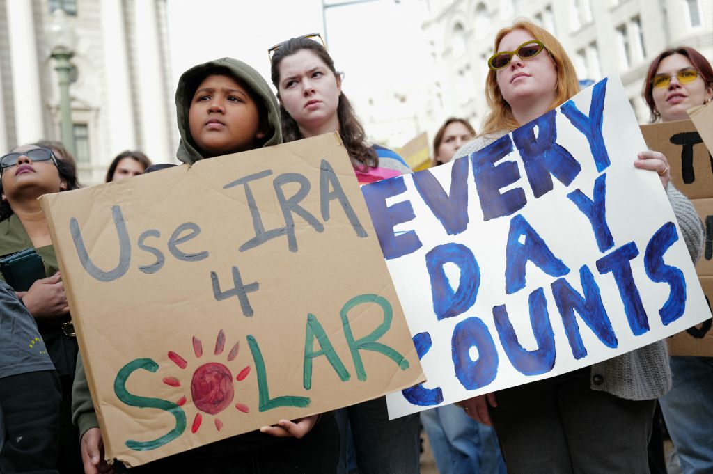 Environmental activists rally to demand climate action before U.S. President-elect Donald Trump takes office in Washington, D.C.