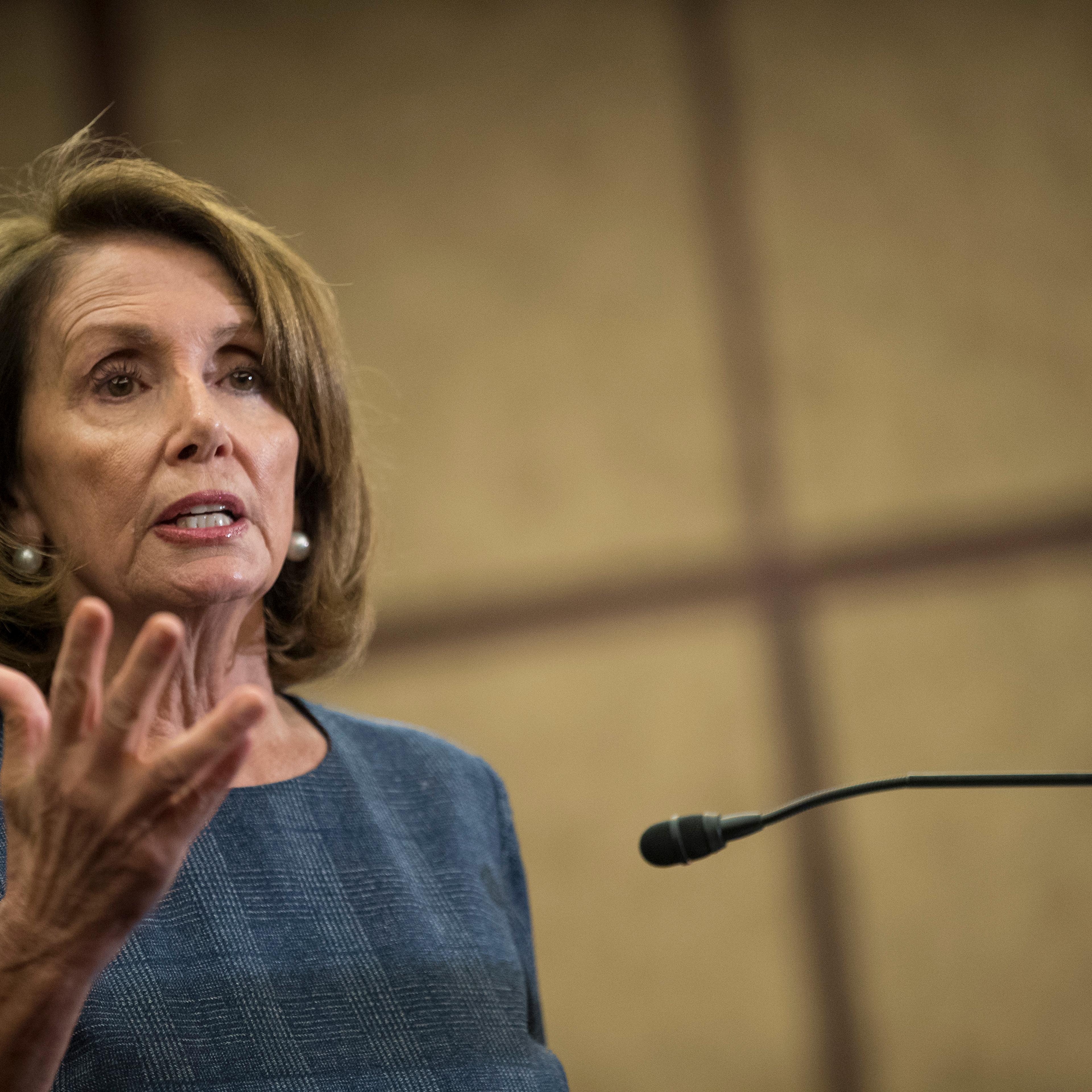 House Minority Leader Nancy Pelosi (D-CA), flanked by House Democrats, speaks about the Affordable Care Act on Capitol Hill Jan. 12, 2017 in Washington, DC.