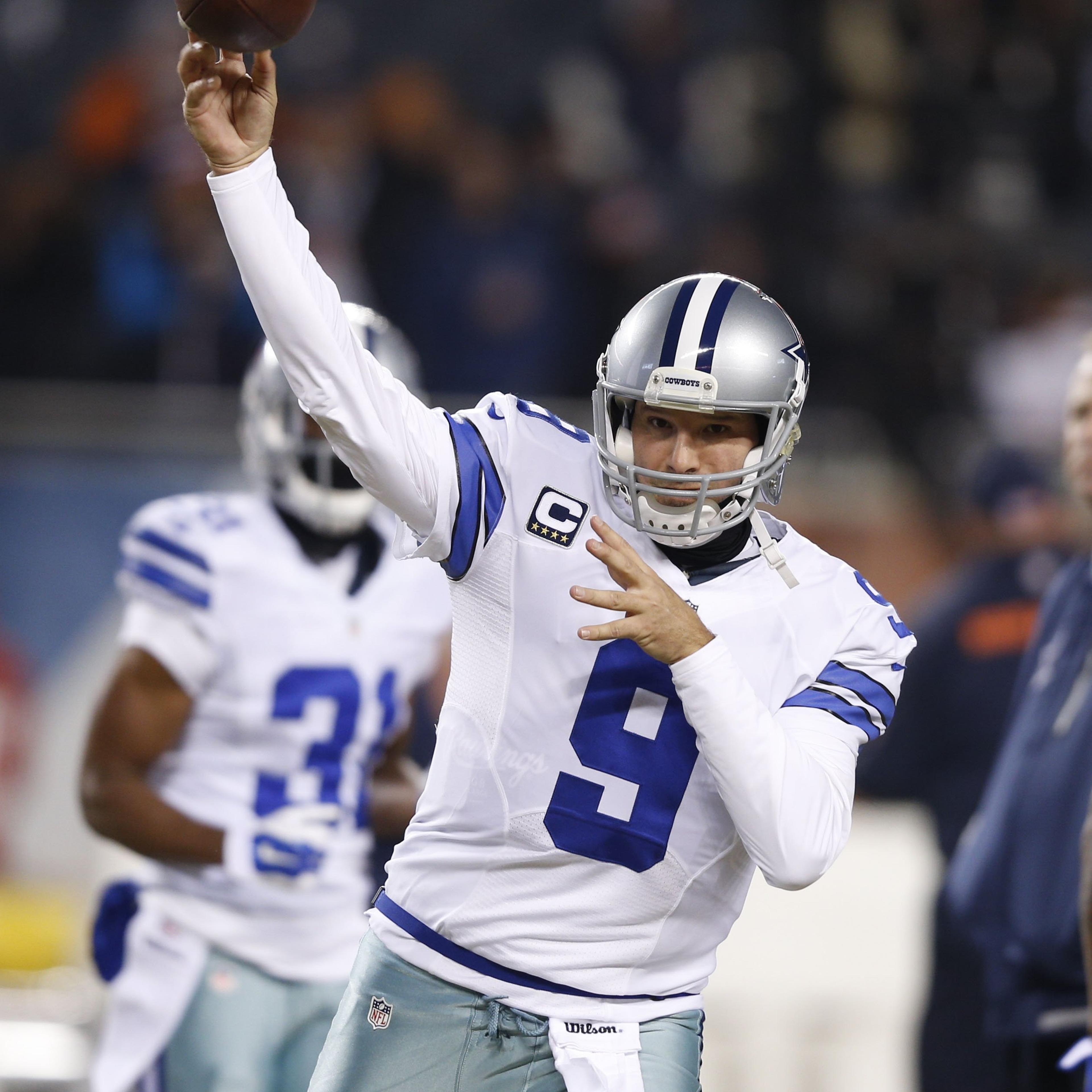 Tony Romo of the Dallas Cowboys warms up before a game against the Chicago Bears at Soldier Field on Dec. 4, 2014 in Chicago, Illinois.