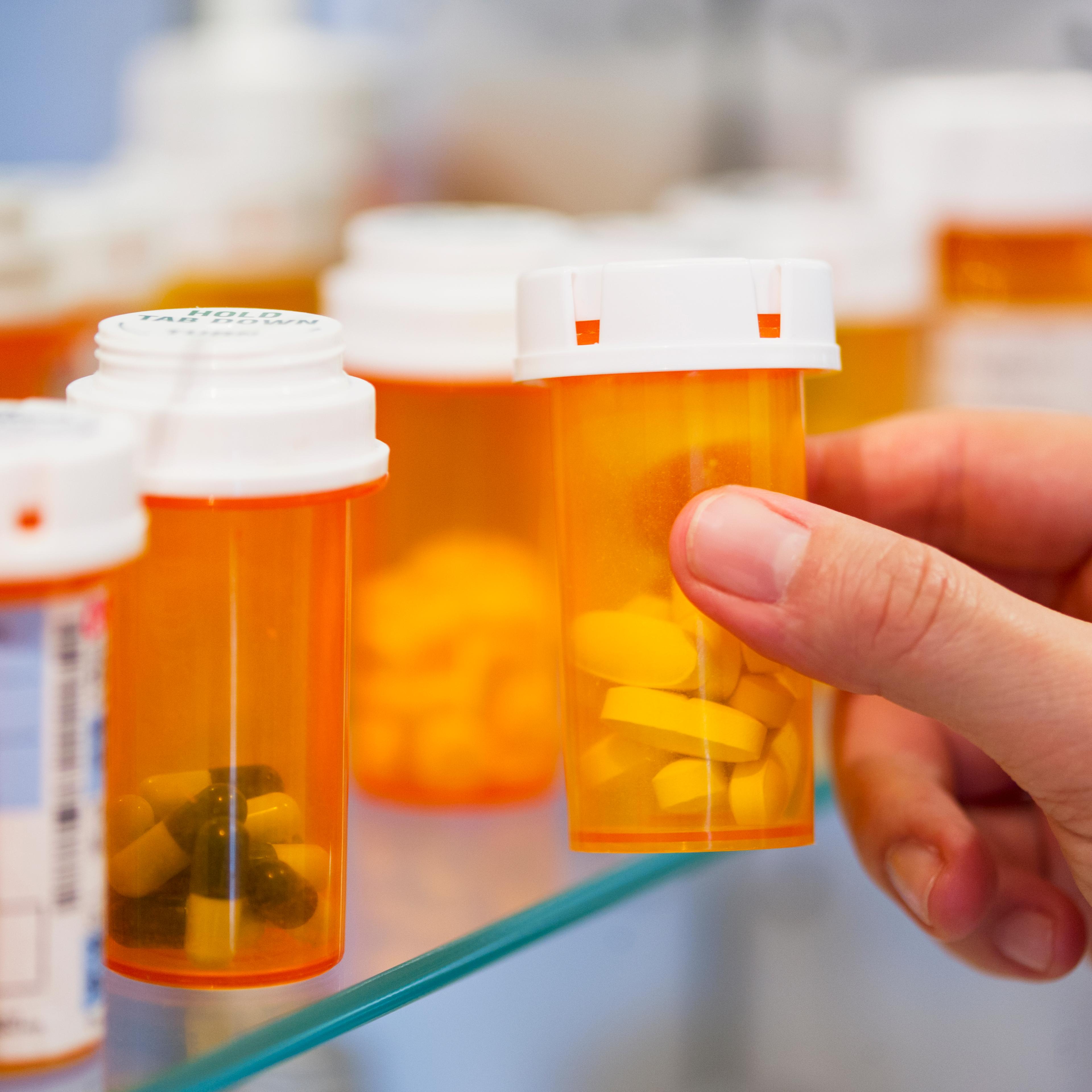 Pill bottles on shelf