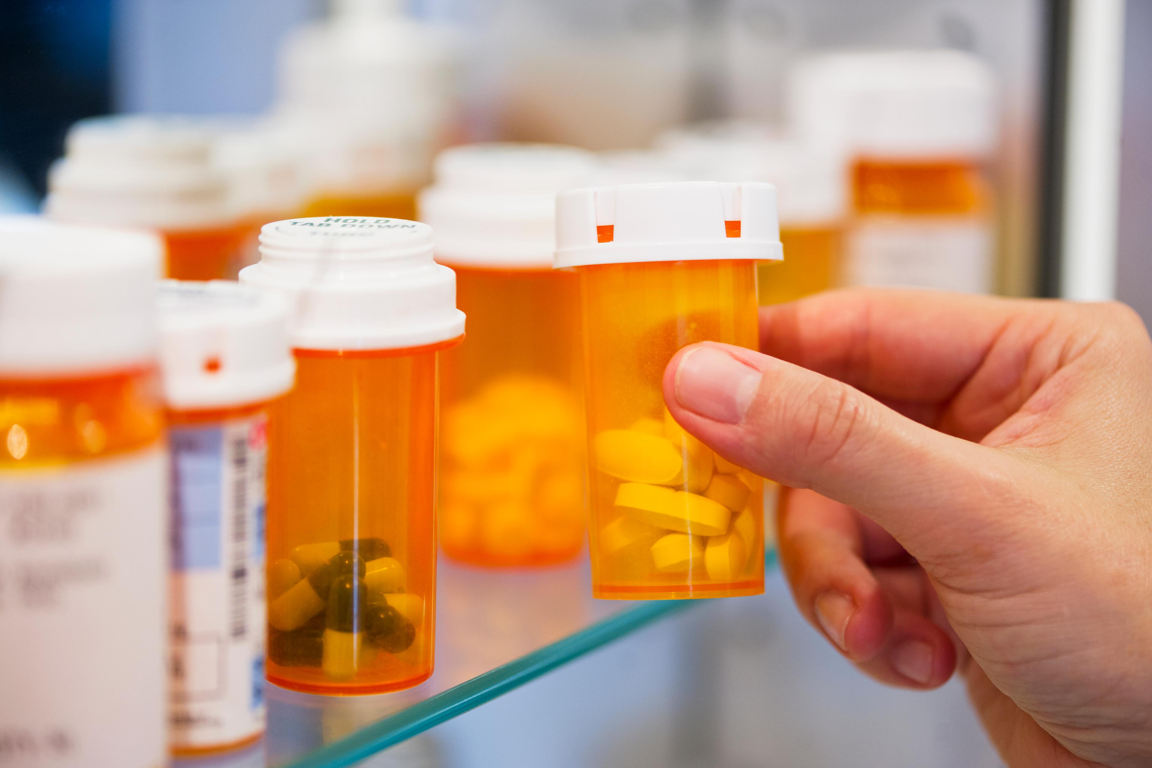 Pill bottles on shelf