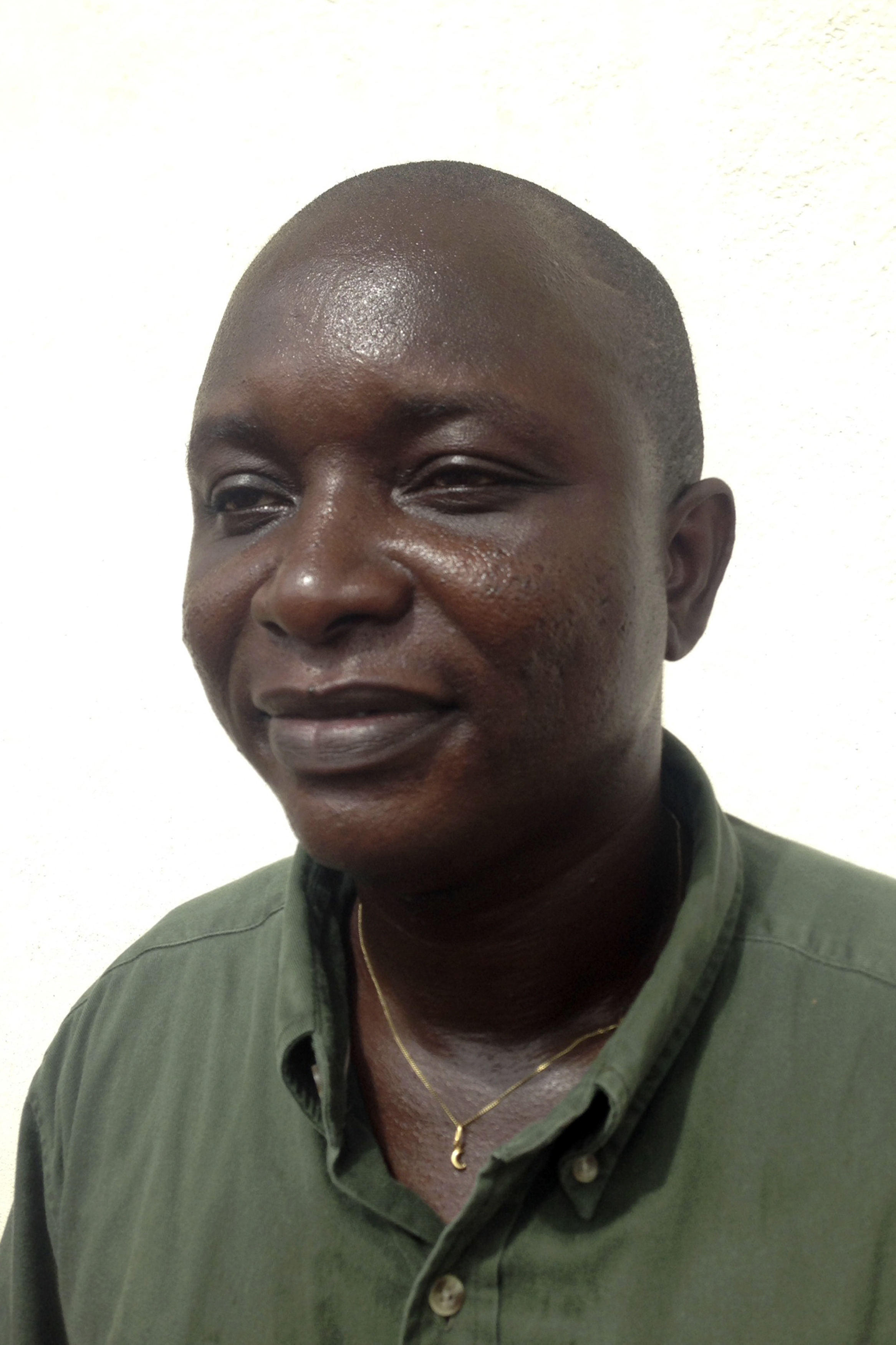 Sheik Umar Khan, head doctor fighting the deadly tropical virus Ebola in Sierra Leone, poses for a picture in Freetown, June 25, 2014.