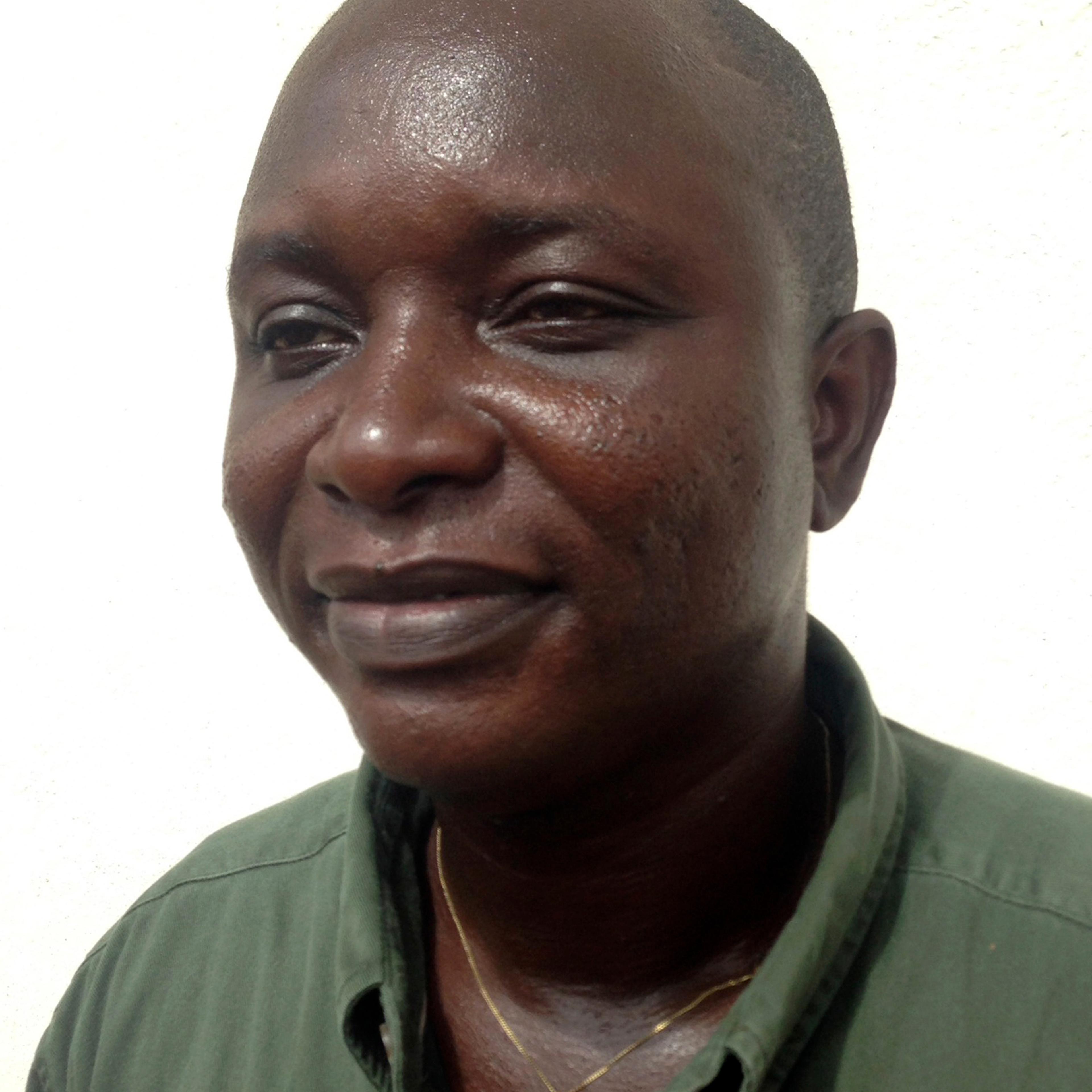 Sheik Umar Khan, head doctor fighting the deadly tropical virus Ebola in Sierra Leone, poses for a picture in Freetown, June 25, 2014.