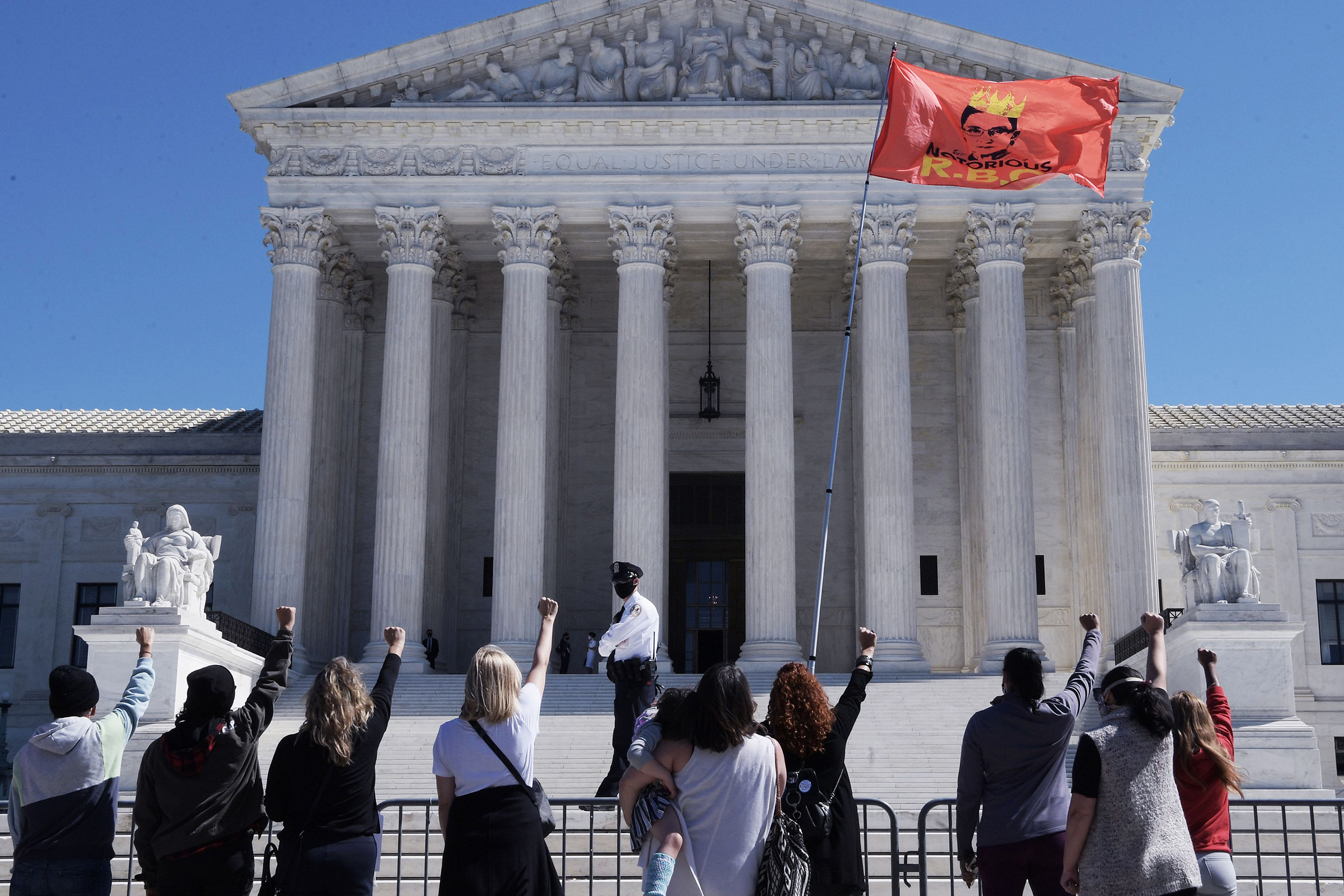 Supporters thronged the steps of the court Sept. 21 for an impromptu vigil honoring the late Justice
