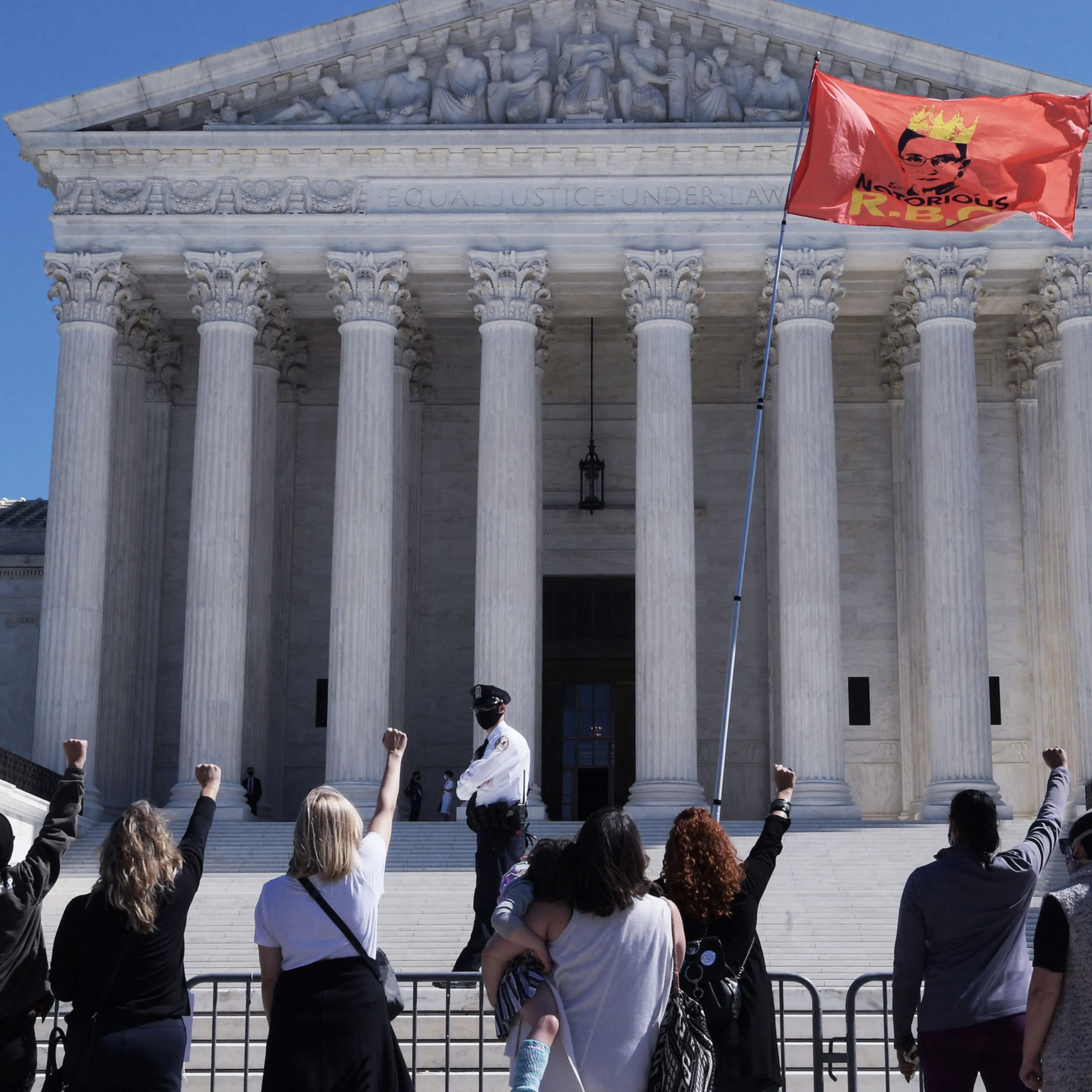 Supporters thronged the steps of the court Sept. 21 for an impromptu vigil honoring the late Justice