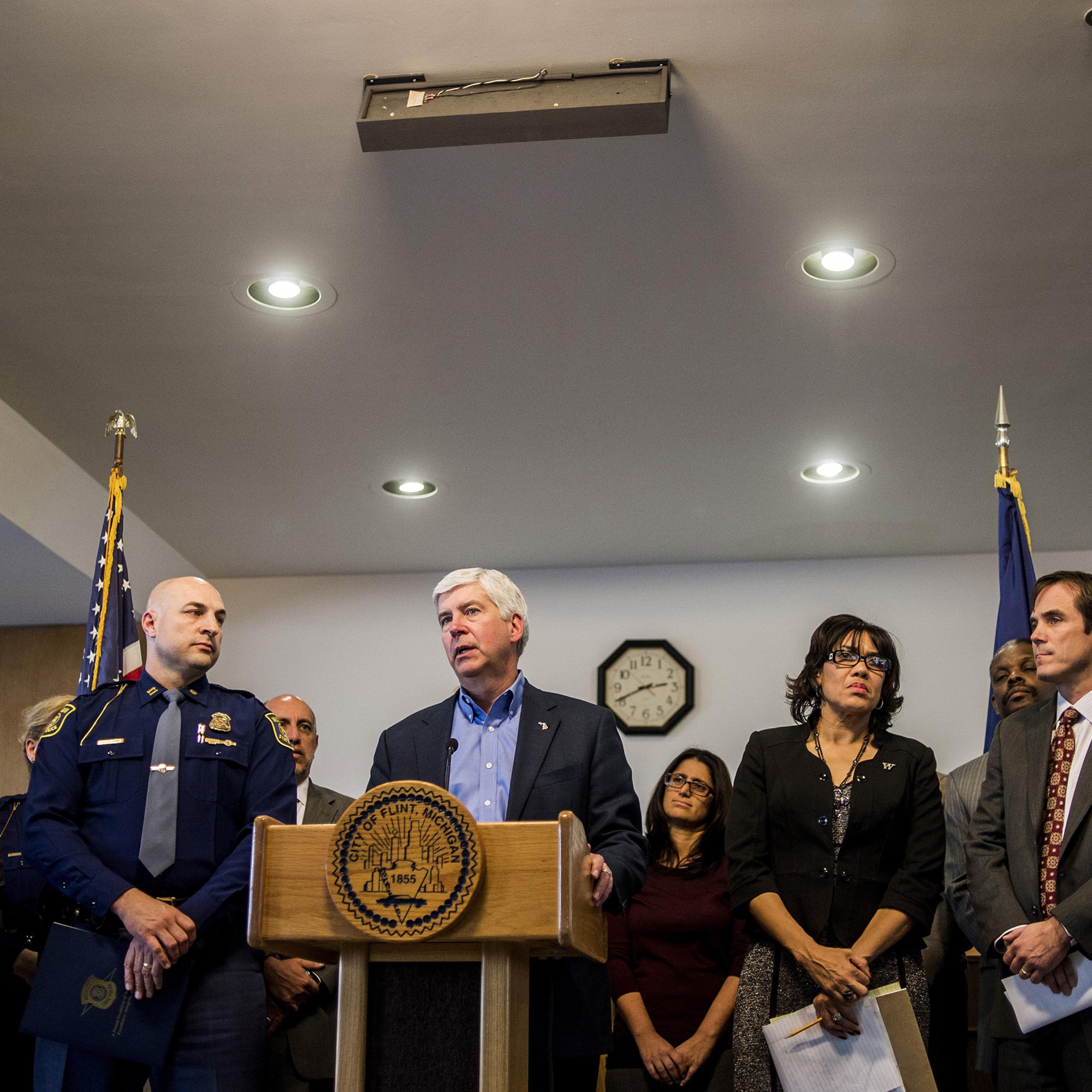 Michigan Gov. Rick Snyder speaks during a news conference in Flint, Mich., Monday, Jan. 11, 2016. Snyder pledged Monday that officials would make contact with every household in Flint to check whether residents have bottled water and a filter and want to