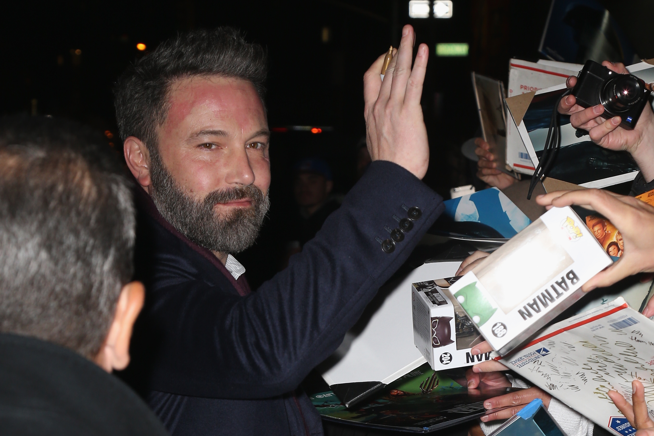 Ben Affleck signs autographs for fans as he departs Ed Sullivan Theater after his taping of 'The Late Show With Stephen Colbert 'on November 16, 2017 in New York City.