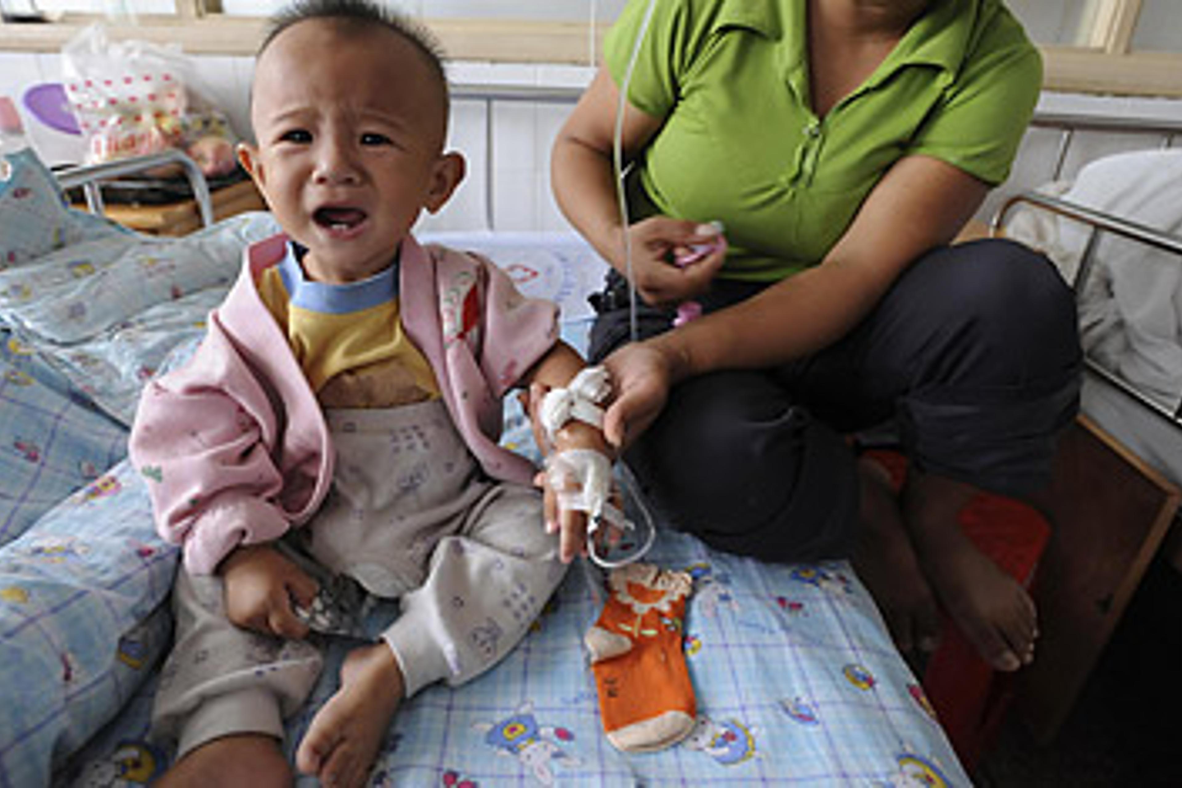 A child who had been poisoned by contaminated milk formula receives medical treatment at a hospital in Hefei, Anhui province.