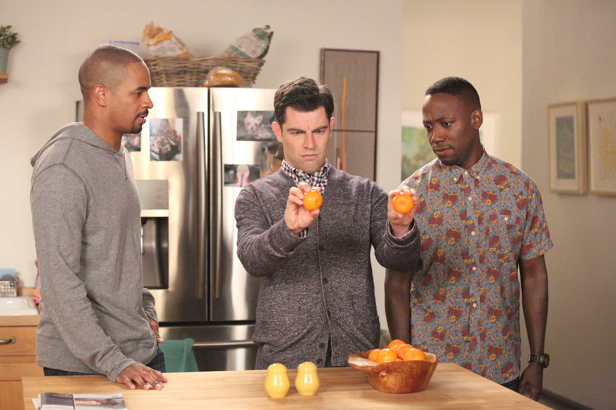 NEW GIRL:   Schmidt (Max Greenfield, C), Coach (Damon Wayans, Jr., L) and Winston (Lamorne Morris, R) visit their neighbors in the "Goldmine" episode of NEW GIRL airing Tuesday, Nov. 11 (9:00-9:30 PM ET/PT) on FOX.  ©2014 Fox Broadcasting Co.  Cr:  Adam 