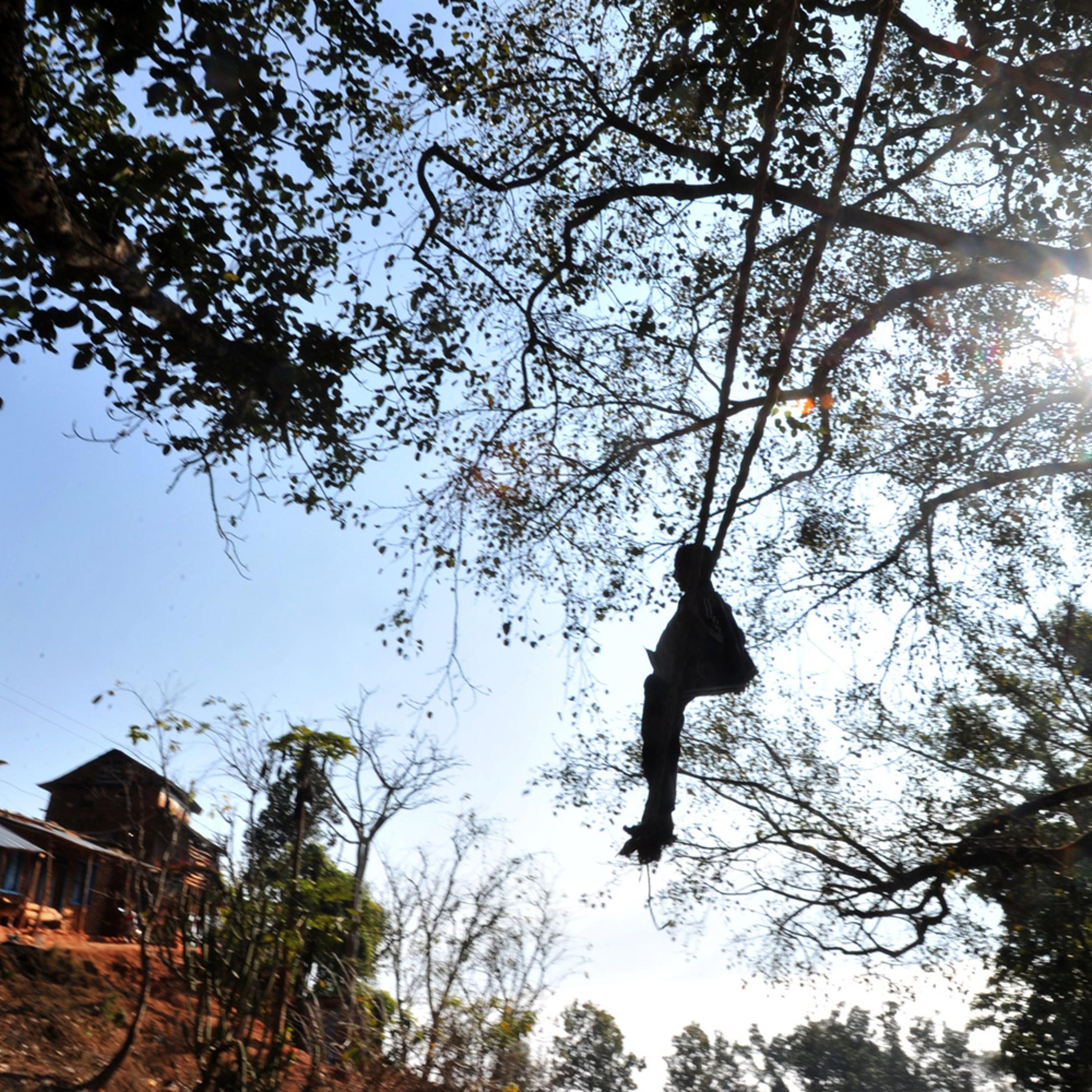 January 15, 2012. A young Nepalese plays on a swing during the Hindu festival of Maghesangranti at Taraka village, Nuwakot district, some 80 kilometers from Kathmandu.