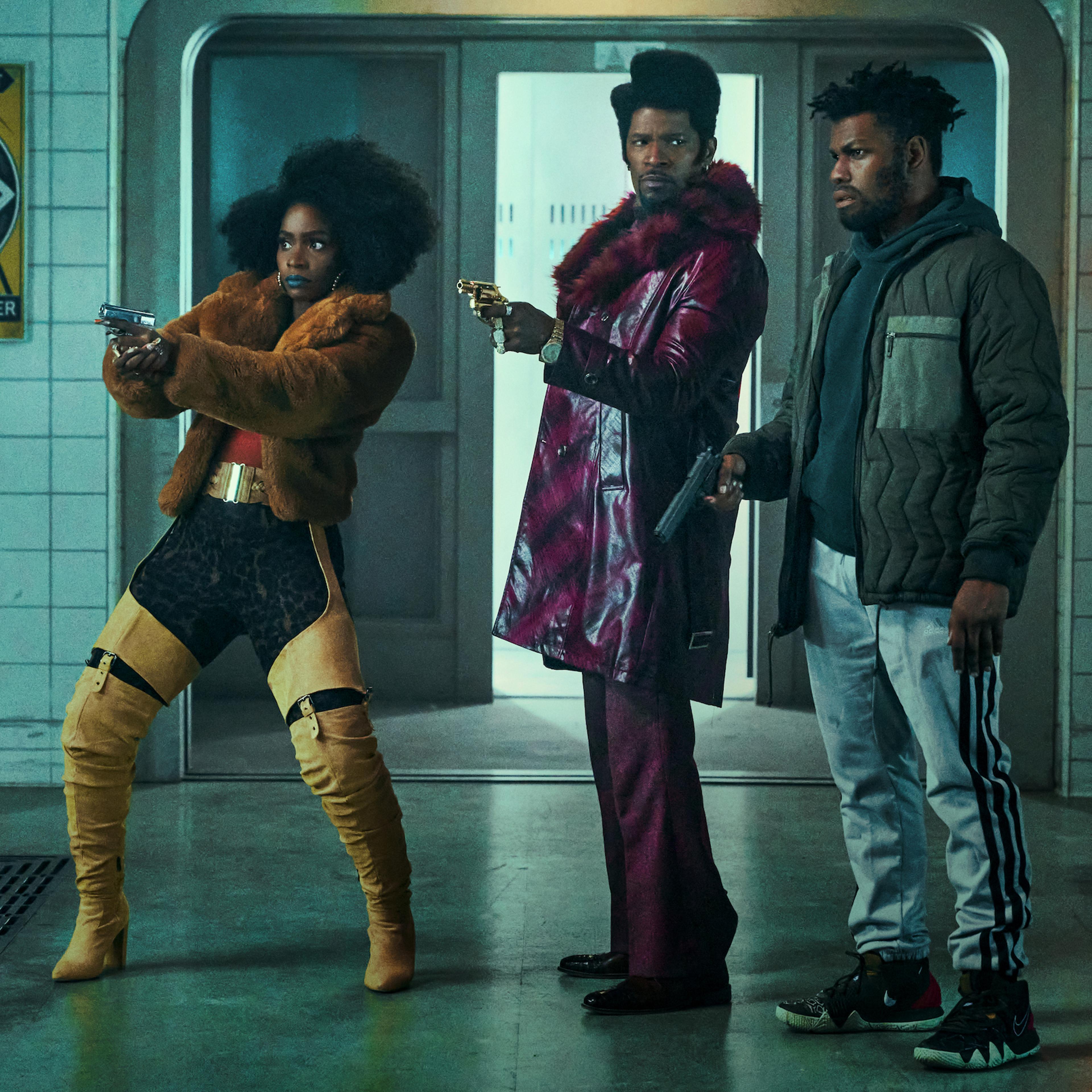 Teyonah Parris as Yo-Yo, Jamie Foxx as Slick Charles, and John Boyega as Fontaine in 'They Cloned Tyrone.'