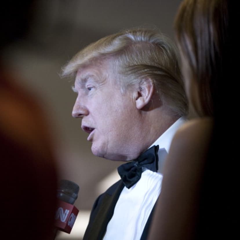 Donald Trump talks with the media at the White House Correspondents' Association (WHCA) dinner in Washington, D.C., U.S., on Saturday, April 30, 2011.