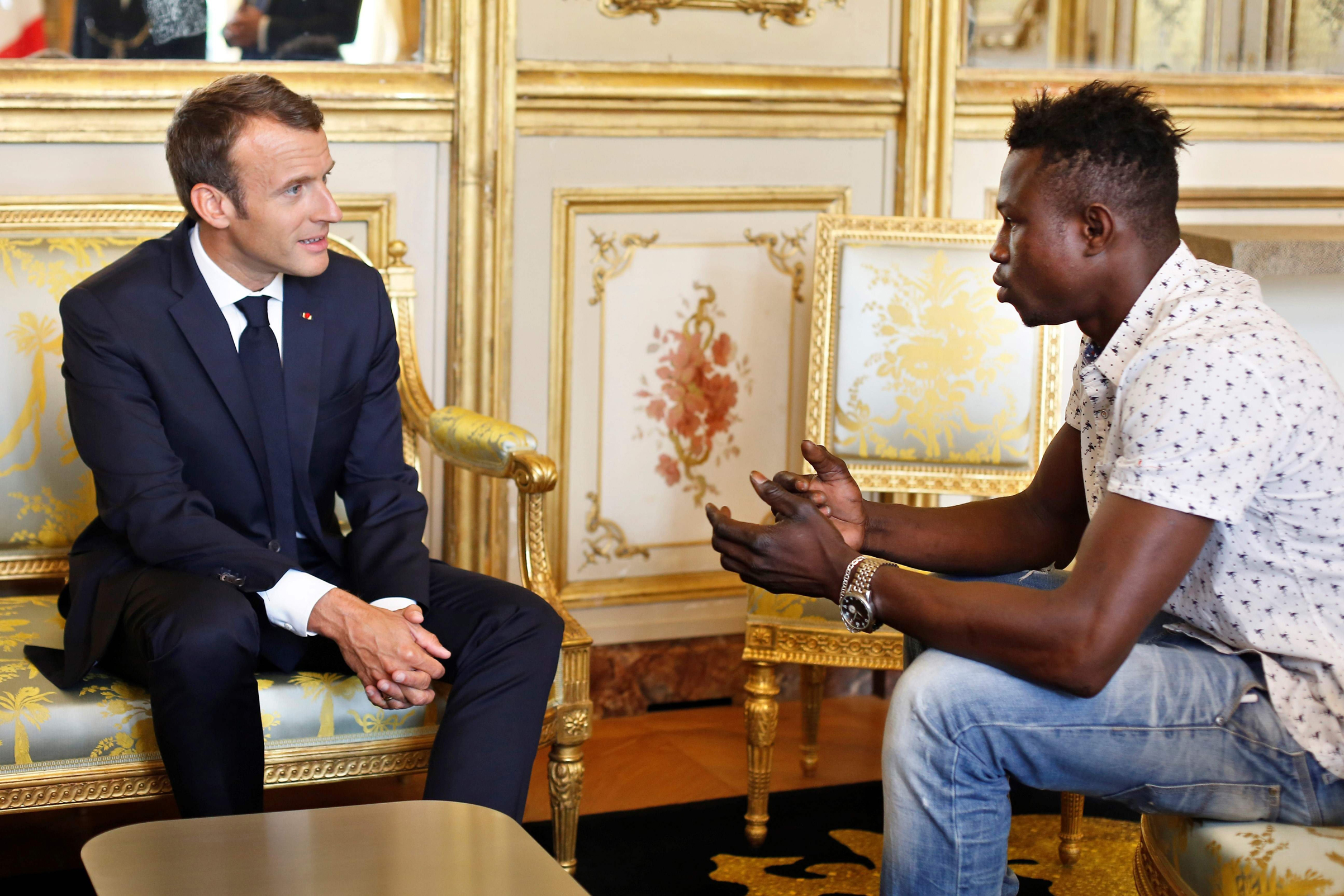 paris-spiderman-migrant-saves-baby