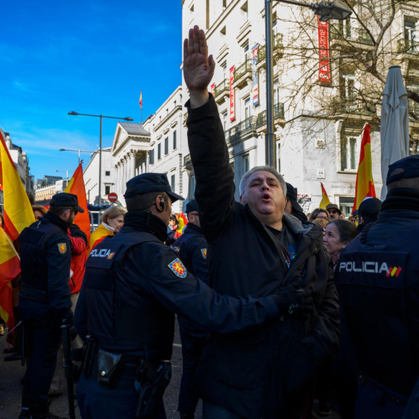 Far right wing supporter making a nazi salute protesting
