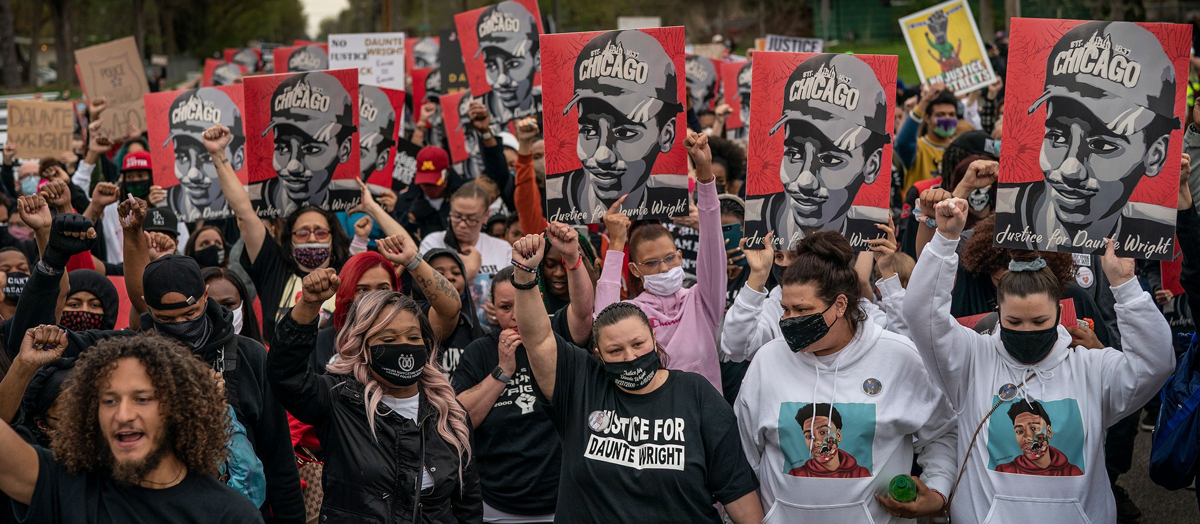 Katie Wright (center) surrounded by supporters marched to the Brooklyn Center Police department, demanding justice for her son Daunte Wright In Brooklyn Center, MN.