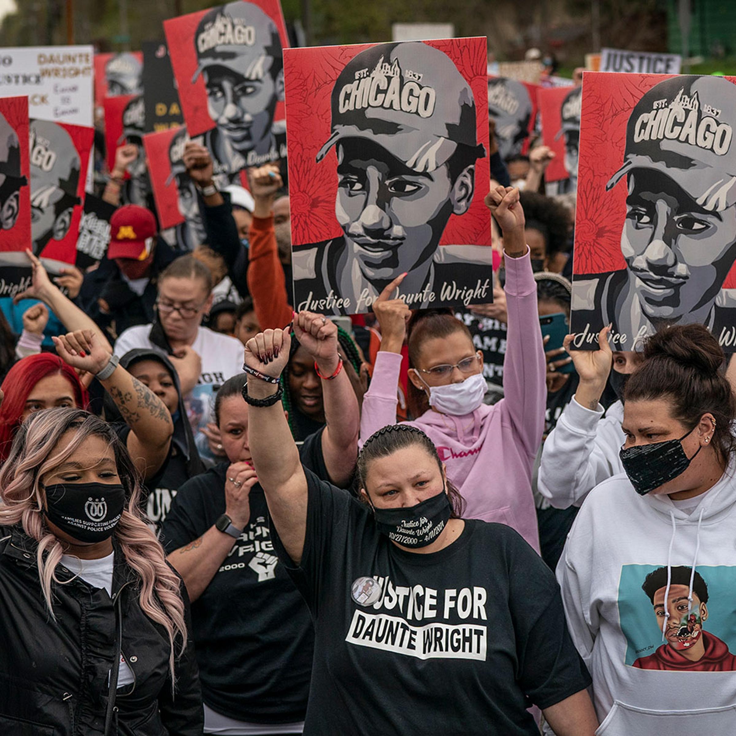 Katie Wright (center) surrounded by supporters marched to the Brooklyn Center Police department, demanding justice for her son Daunte Wright In Brooklyn Center, MN.