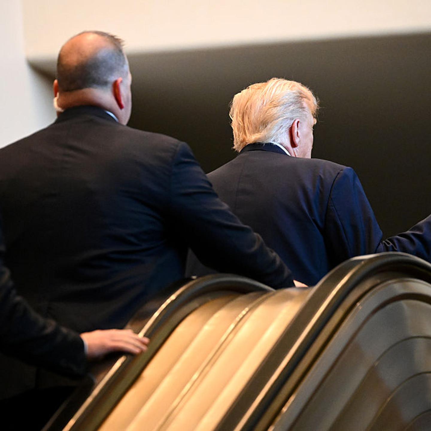 President Donald Trump gestures after walking up an escalator as he arrives to the 80th session of the U.N.’s General Assembly at the United Nations headquarters in New York City on September 23, 2025.