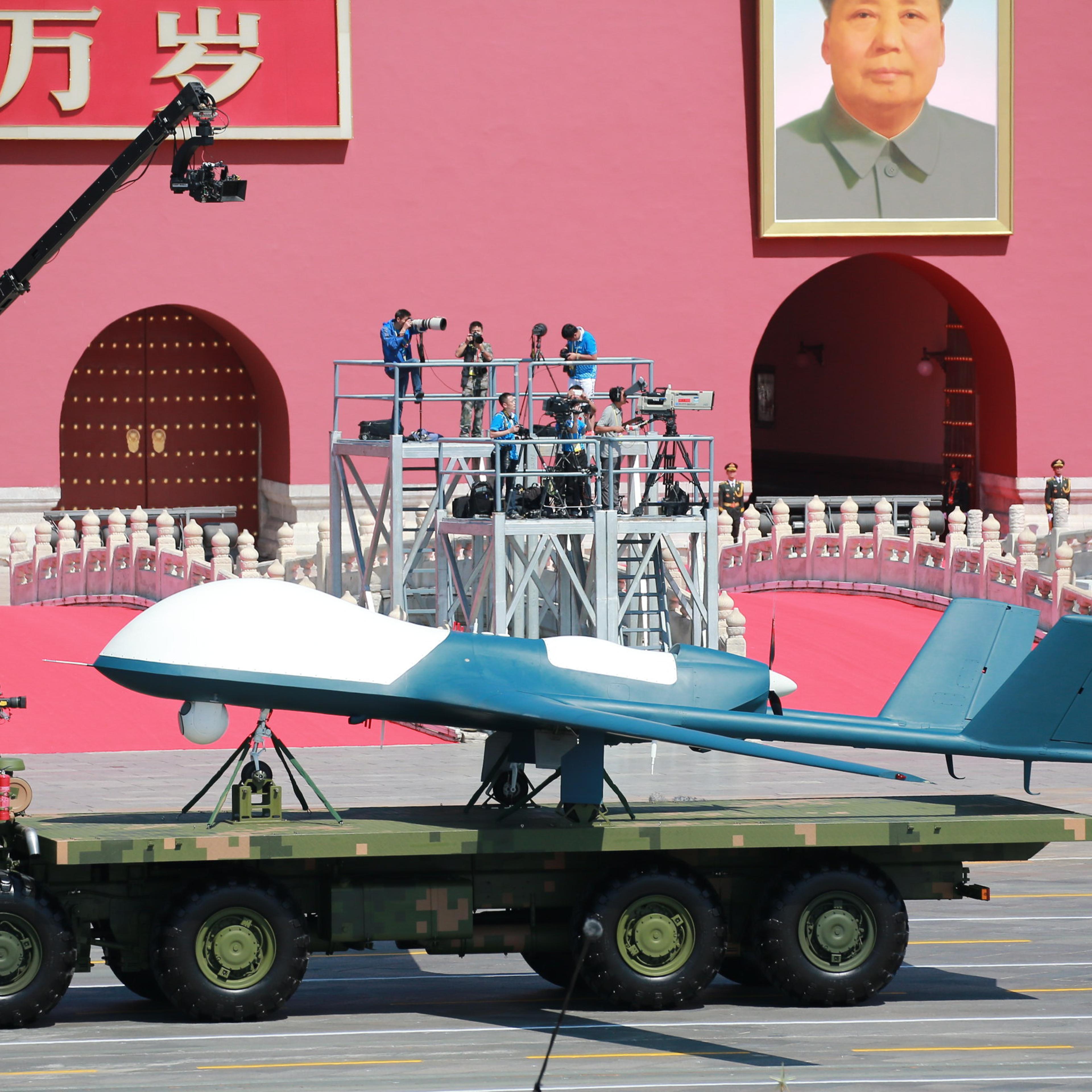 China announces 300,000 troop cuts at military parade