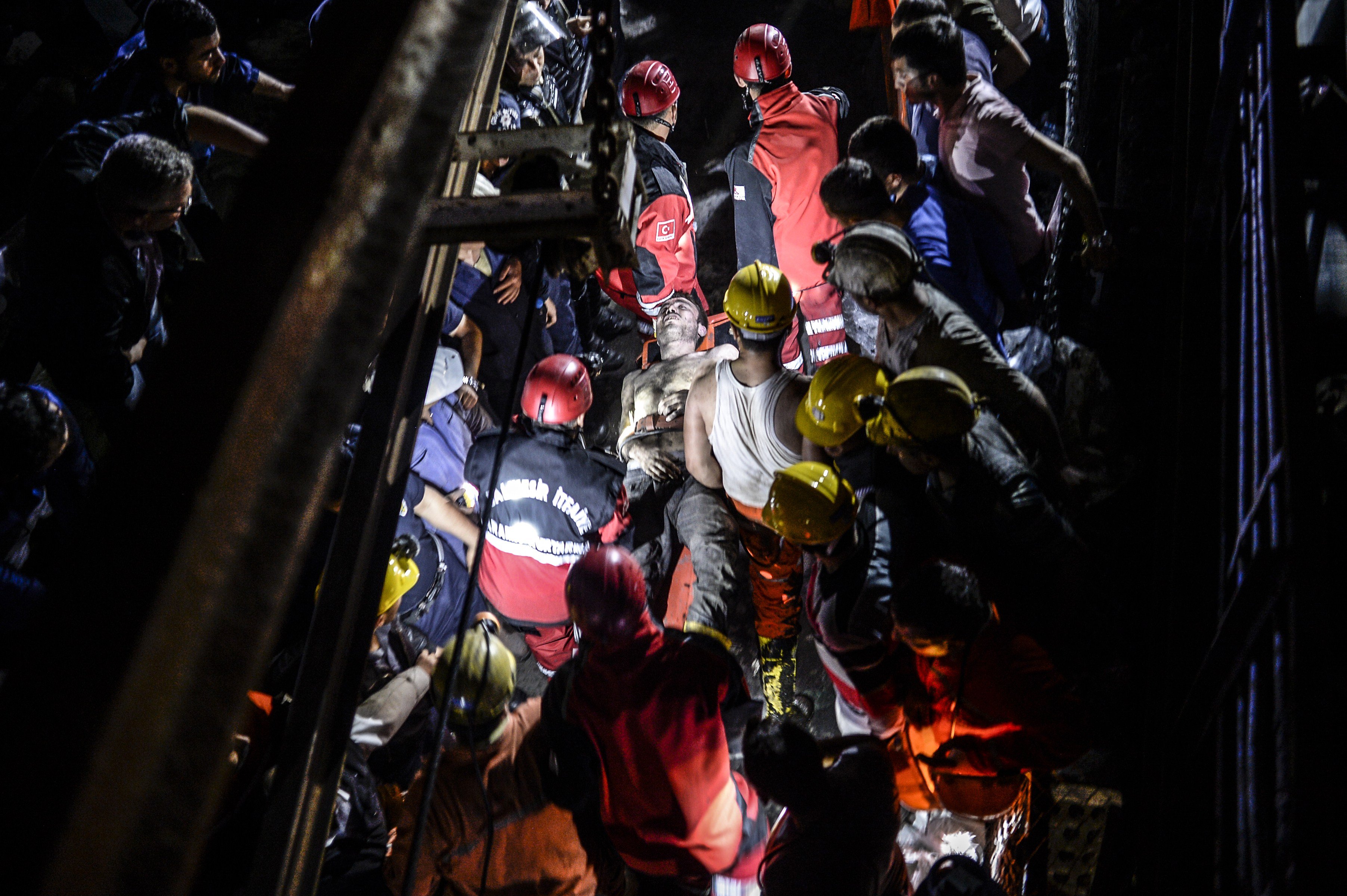 An injured miner came out carried by rescuers after an explosion in Manisa on May 13, 2014.
