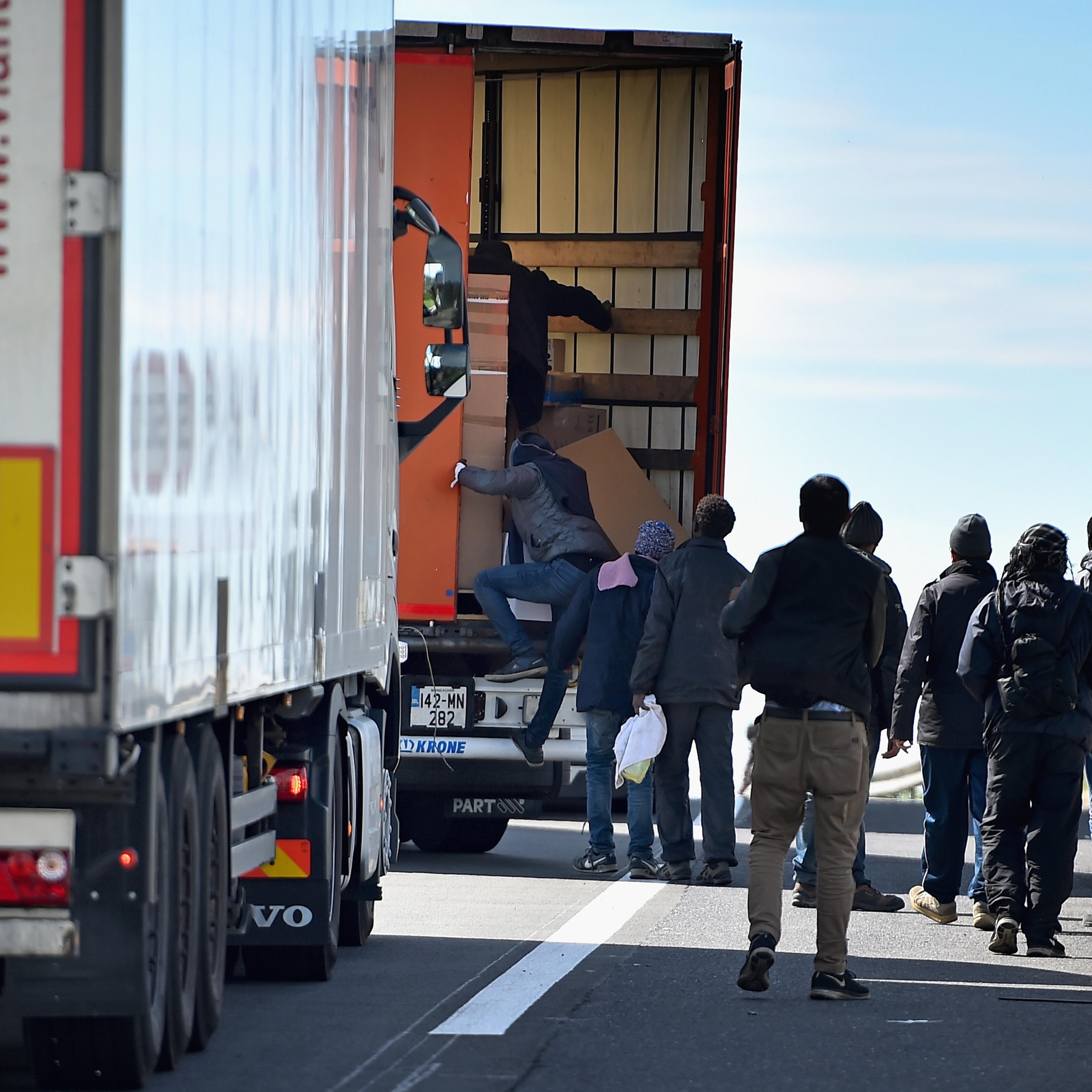Migrants continue to try and board lorries bound for the United Kingdom on June 25, 2015 in Calais, France.