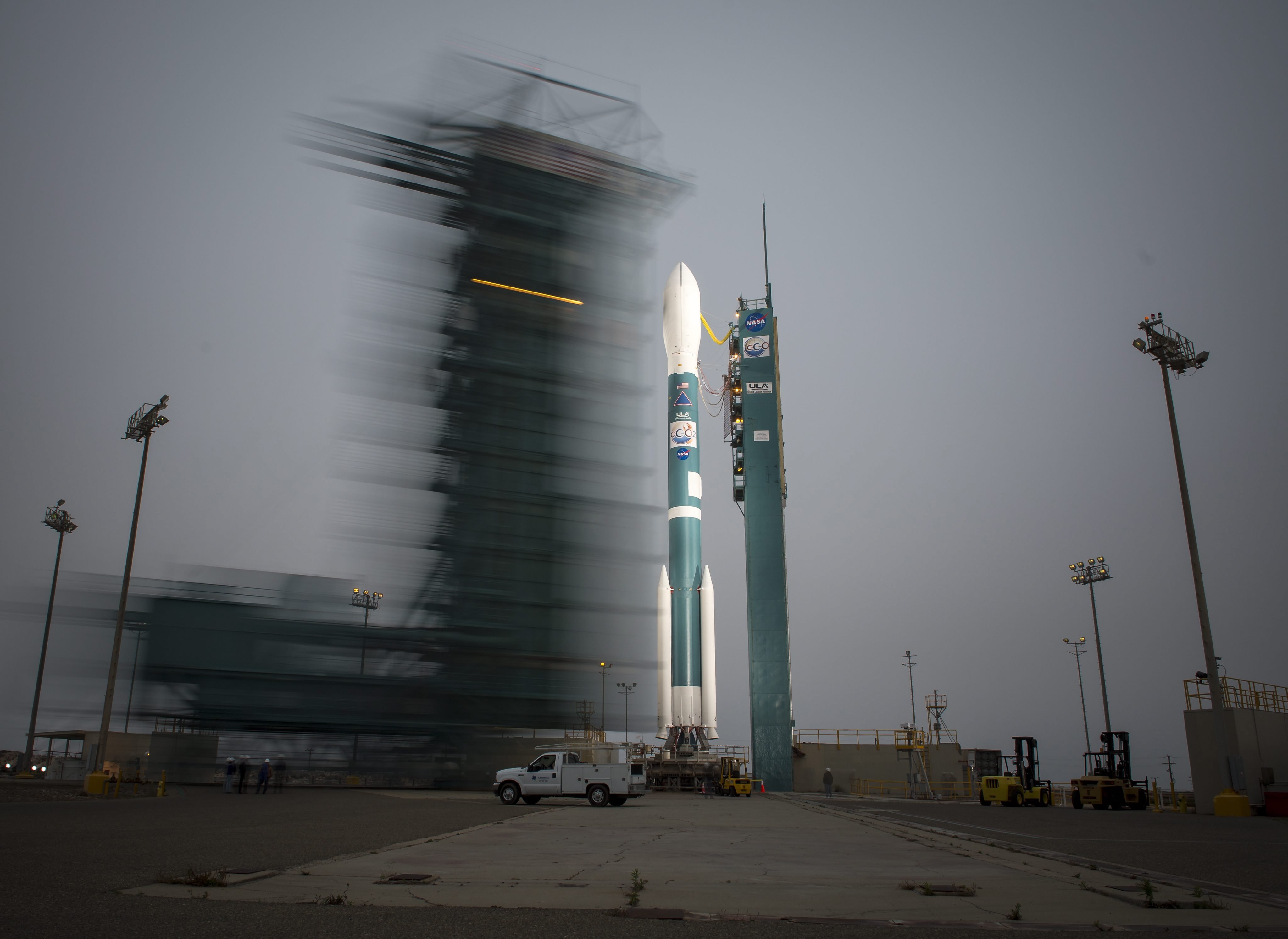 The launch gantry is rolled back to reveal the United Launch Alliance Delta II rocket with the Orbiting Carbon Observatory-2 (OCO-2) satellite onboard, at the Space Launch Complex Two, of the Vandenberg Air Force Base, California, on June 30, 2014.