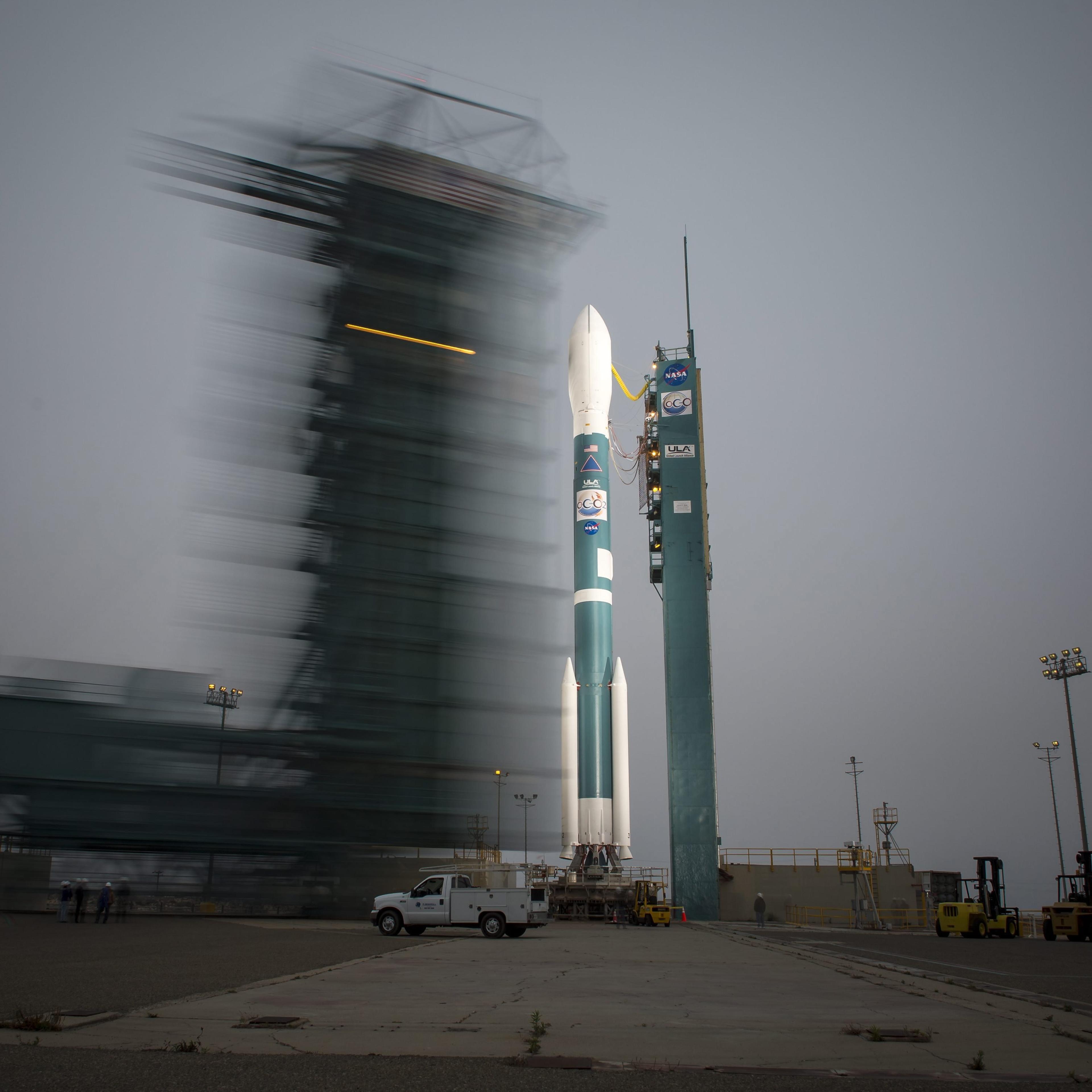 The launch gantry is rolled back to reveal the United Launch Alliance Delta II rocket with the Orbiting Carbon Observatory-2 (OCO-2) satellite onboard, at the Space Launch Complex Two, of the Vandenberg Air Force Base, California, on June 30, 2014.