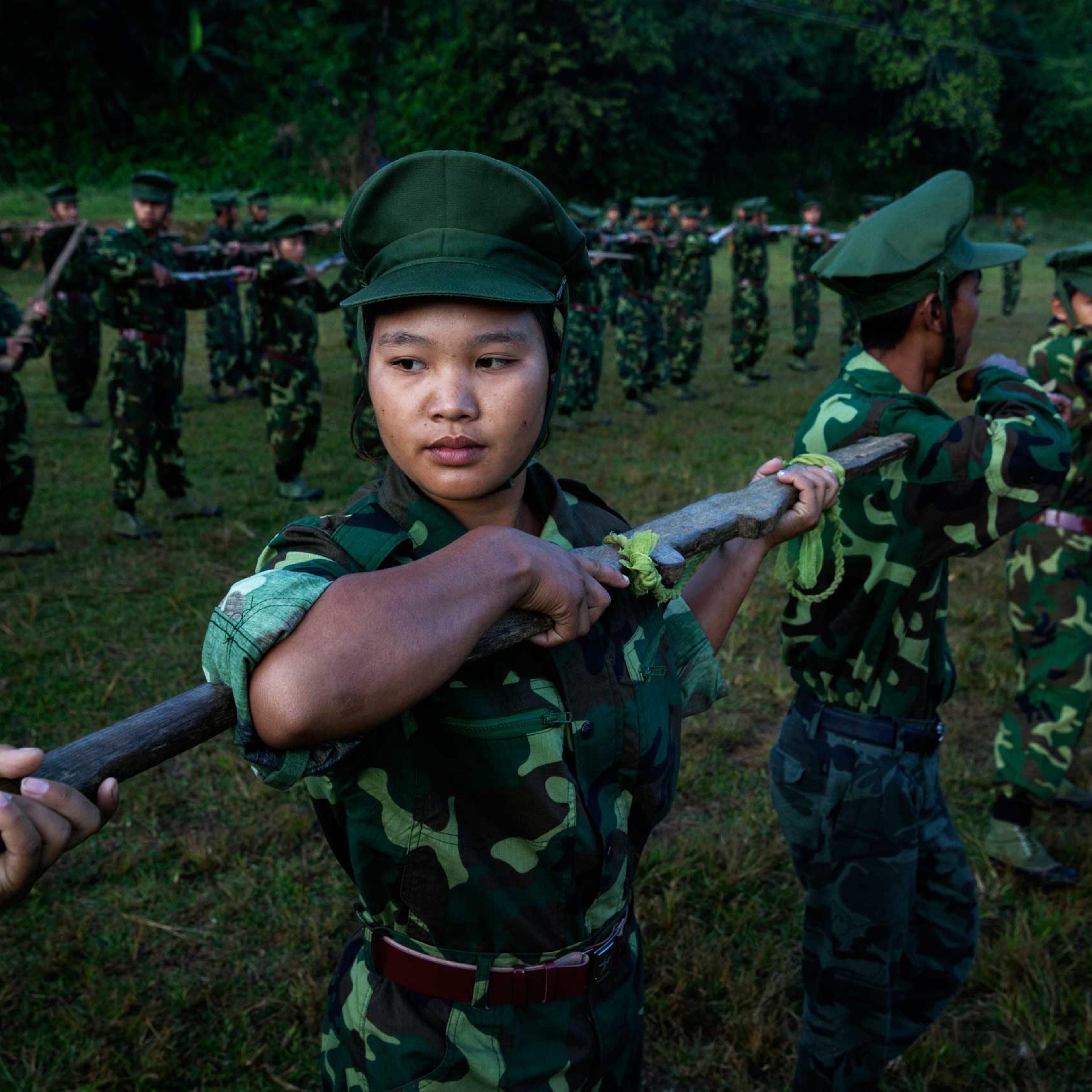 High school and university students receive drill instructions in Laiza, which lies in a Kachin Independence Army–controlled part of Kachin state, in Burma, on Nov. 10, 2014.