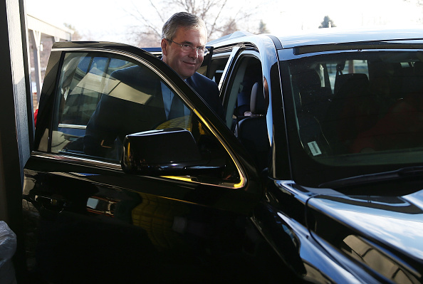 Republican presidential candidate former Florida Governor Jeb Bush enters his vehicle after attending a campaign event at the Westside Conservatives Club breakfast at the Machine Shed restaurant on January 13, 2016 in Urbandale, Iowa.