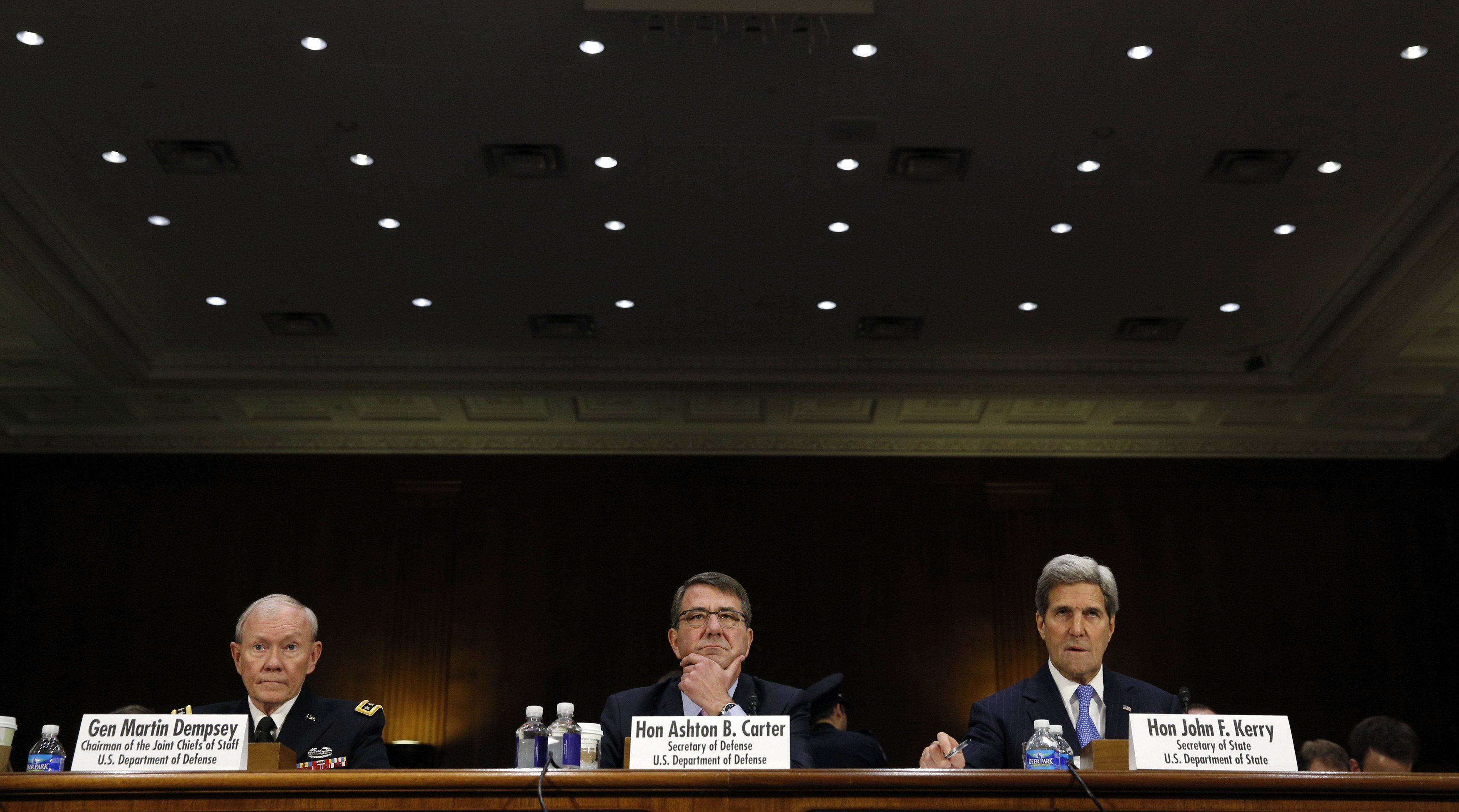Joint Chiefs of Staff Chairman Army Gen. Martin Dempsey (L), U.S. Defense Secretary Ash Carter (C) and Secretary of State John Kerry testify at a Senate Foreign Relations Committee hearing on "The President's Request for Authorization to Use Force Agains
