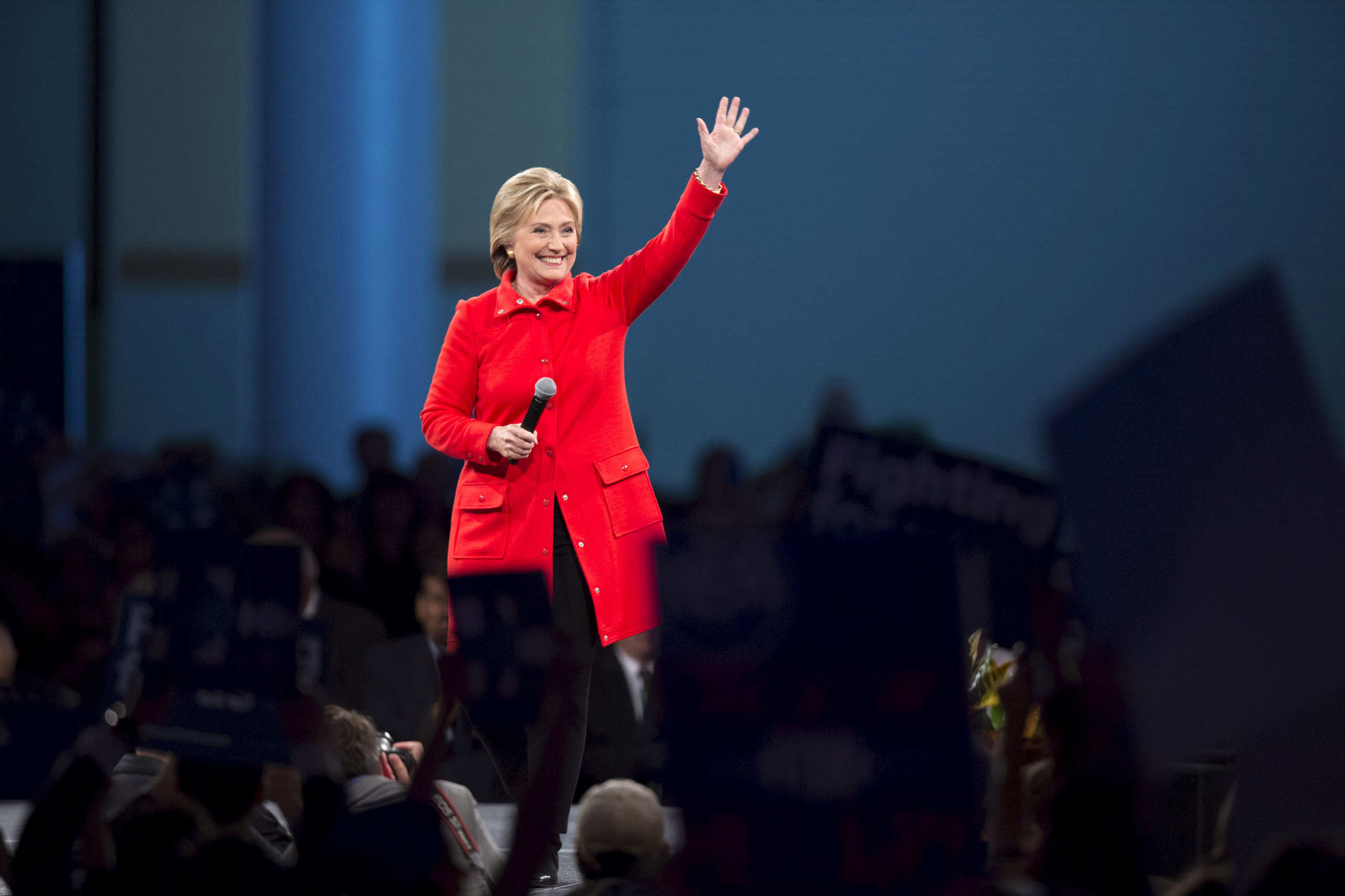 Democratic presidential candidate Hillary Clinton speaks during the 2015 Jefferson-Jackson Dinner with fellow candidates Martin O'Malley and Bernie Sanders in Des Moines, Iowa