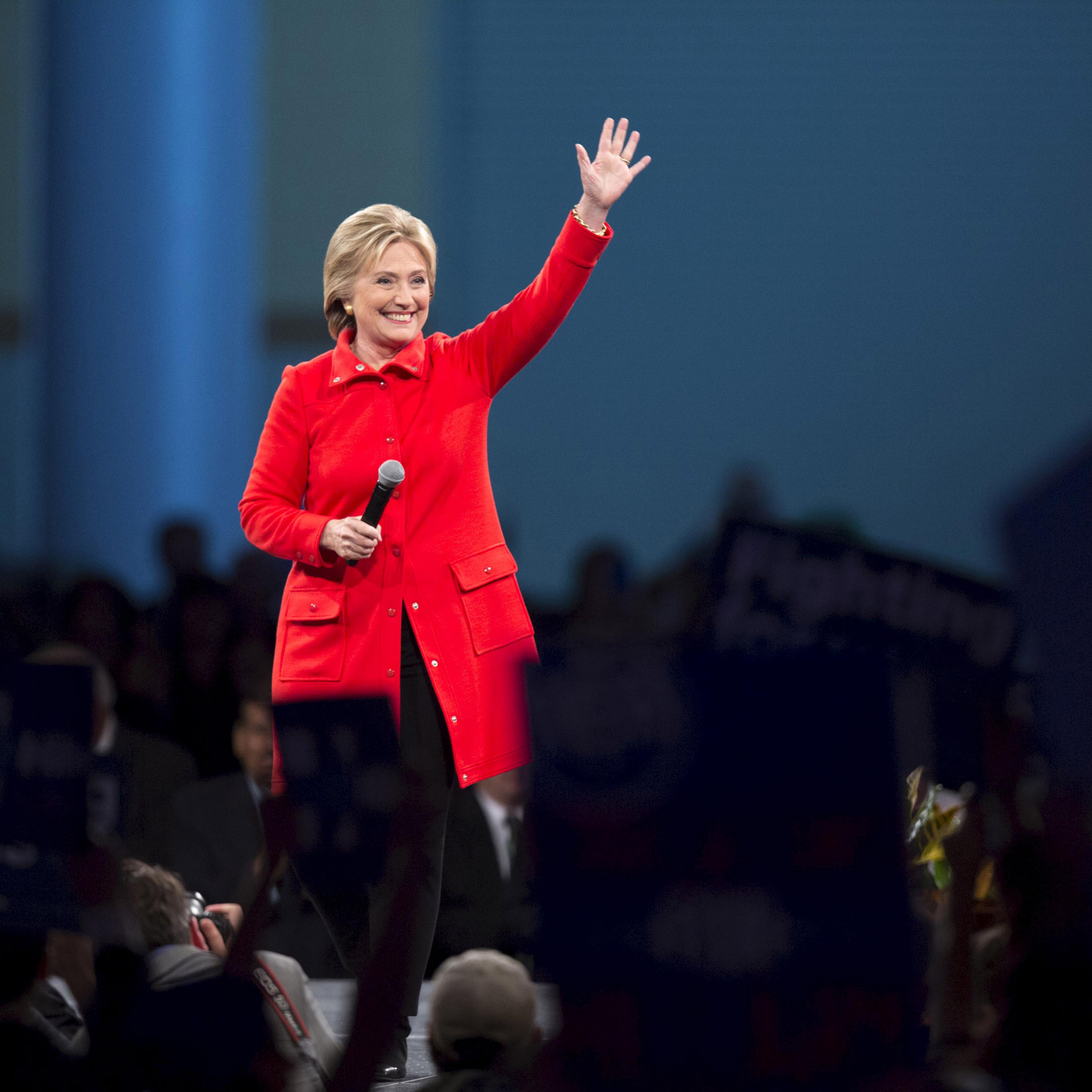 Democratic presidential candidate Hillary Clinton speaks during the 2015 Jefferson-Jackson Dinner with fellow candidates Martin O'Malley and Bernie Sanders in Des Moines, Iowa