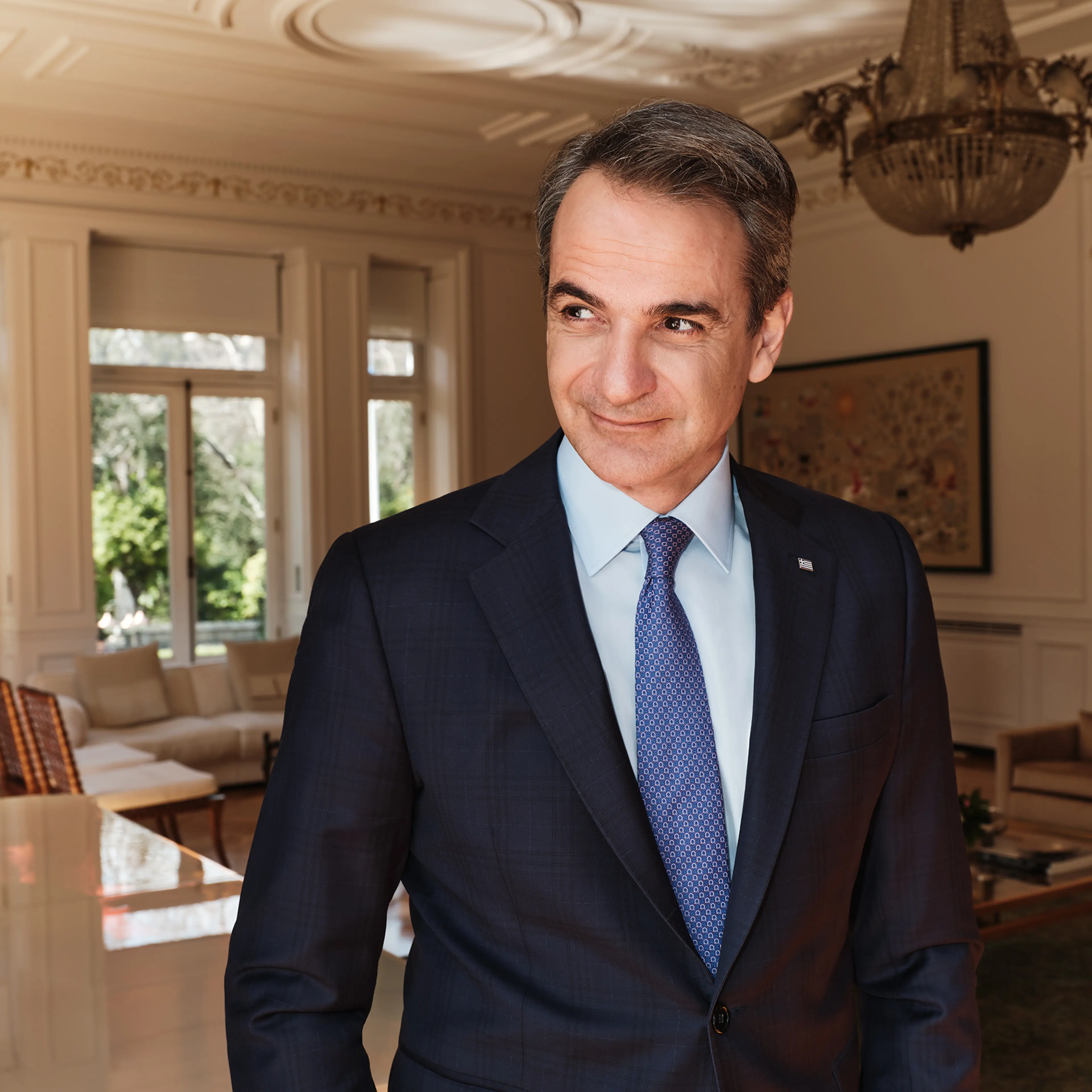 Kyriakos Mitsotakis poses for a portrait inside the reception room at the Maximos Mansion in Athens on March 12.