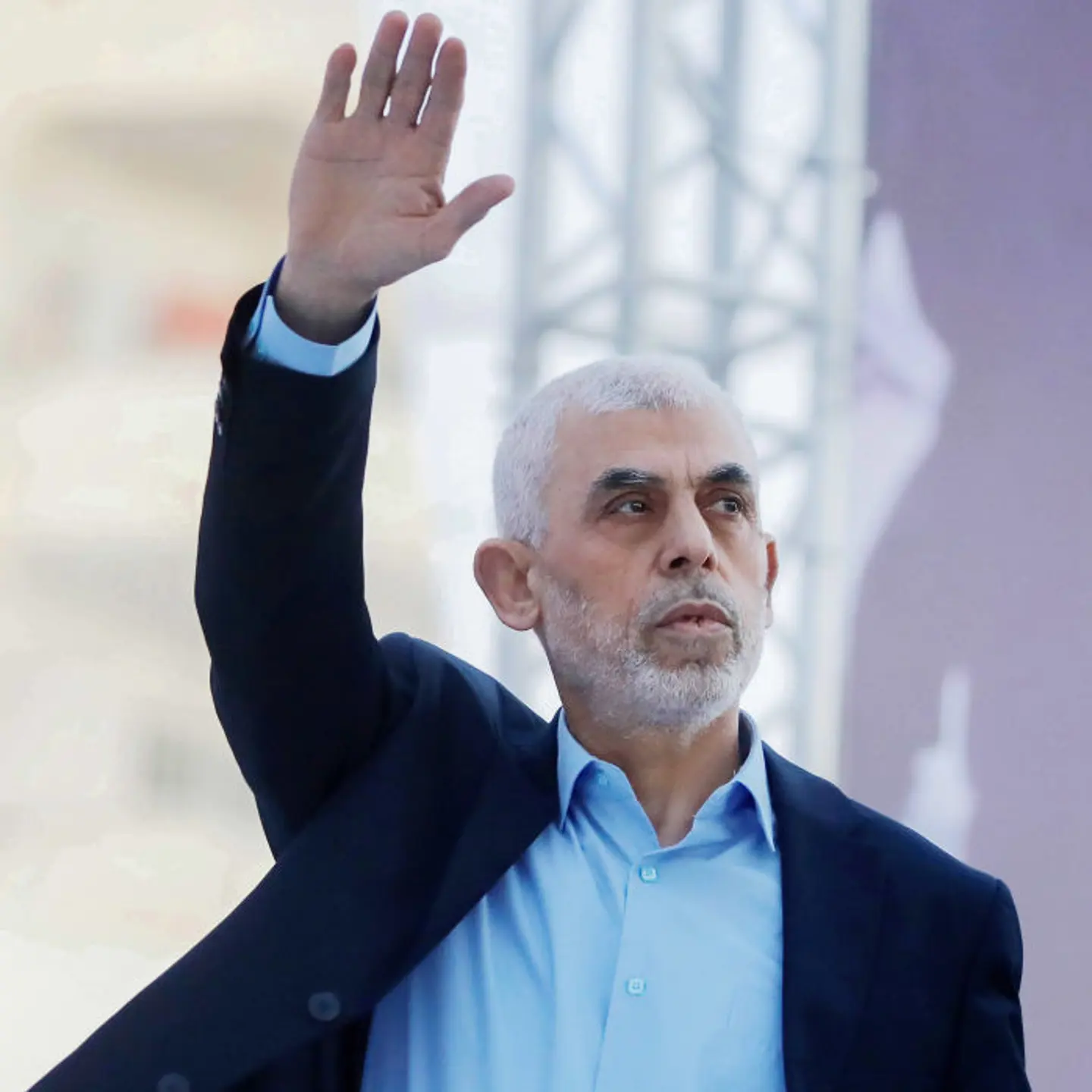 Yahya Sinwar, head of the Palestinian Islamic movement Hamas in the Gaza Strip, waves his hand to the crowd during the celebration of International Quds Day in Gaza City.