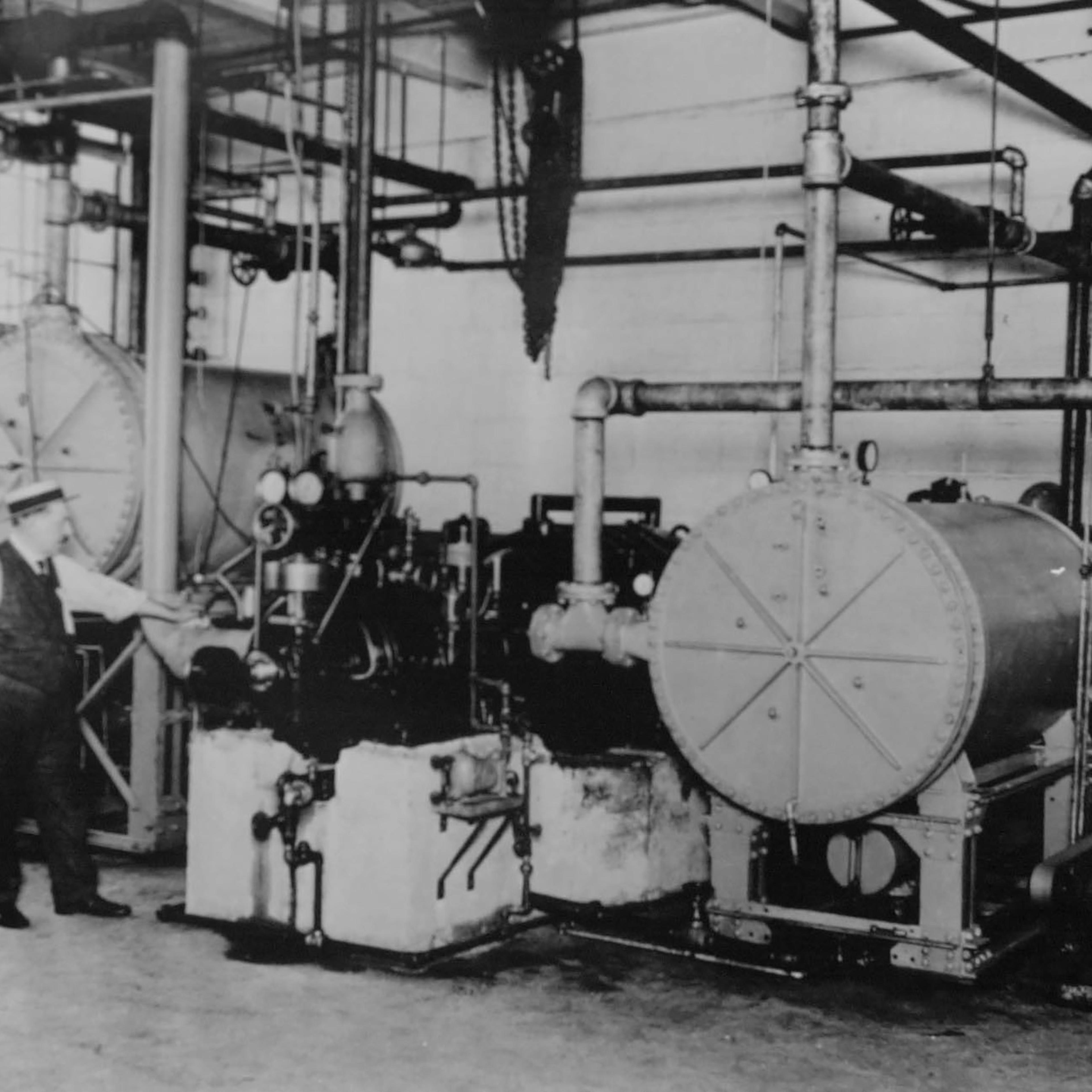 The first centrifugal refrigeration machine invented by Willis H. Carrier, the father of air conditioning, is pictured in Syracuse, New York in 1922.