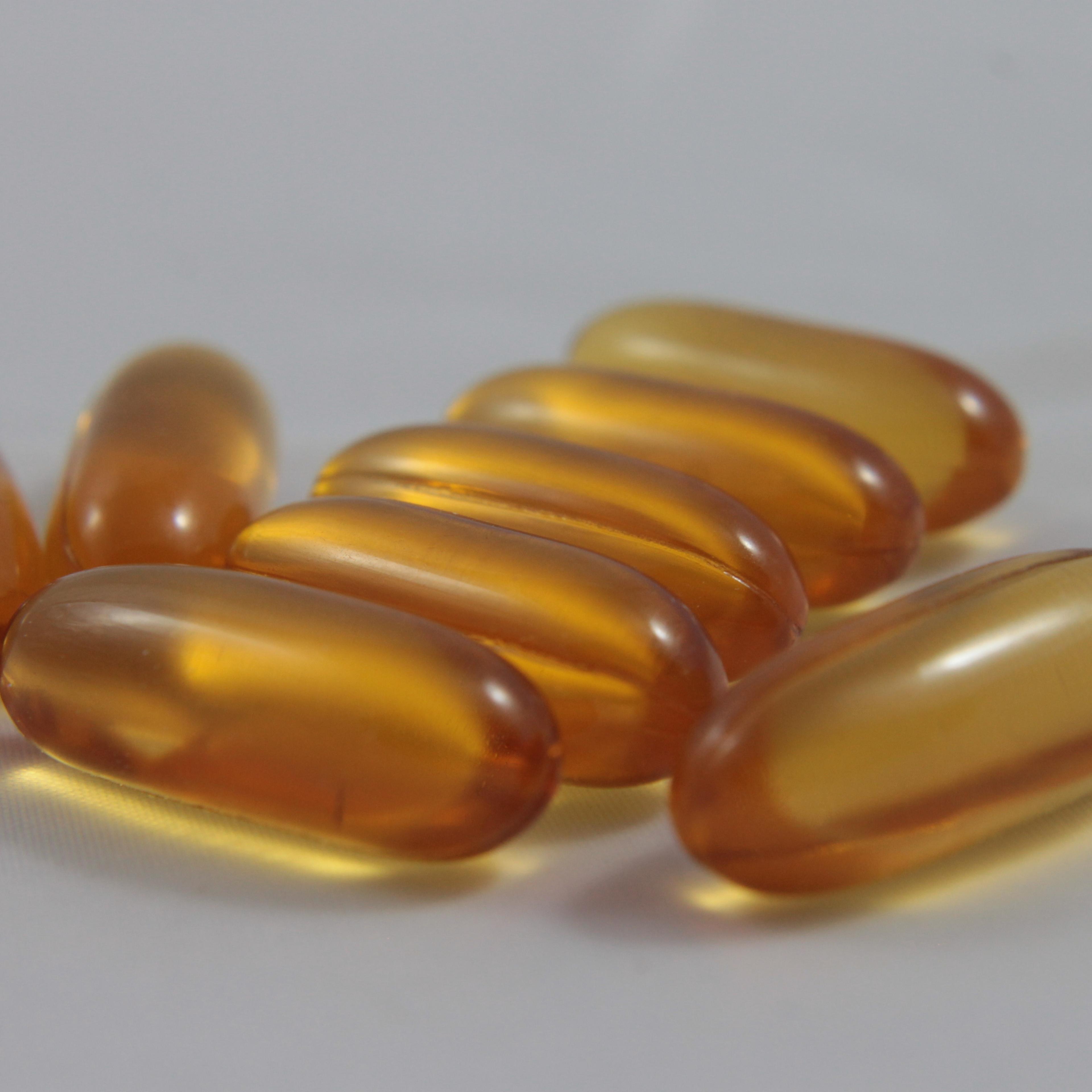 Close-Up Of Omega-3 Capsules On Table