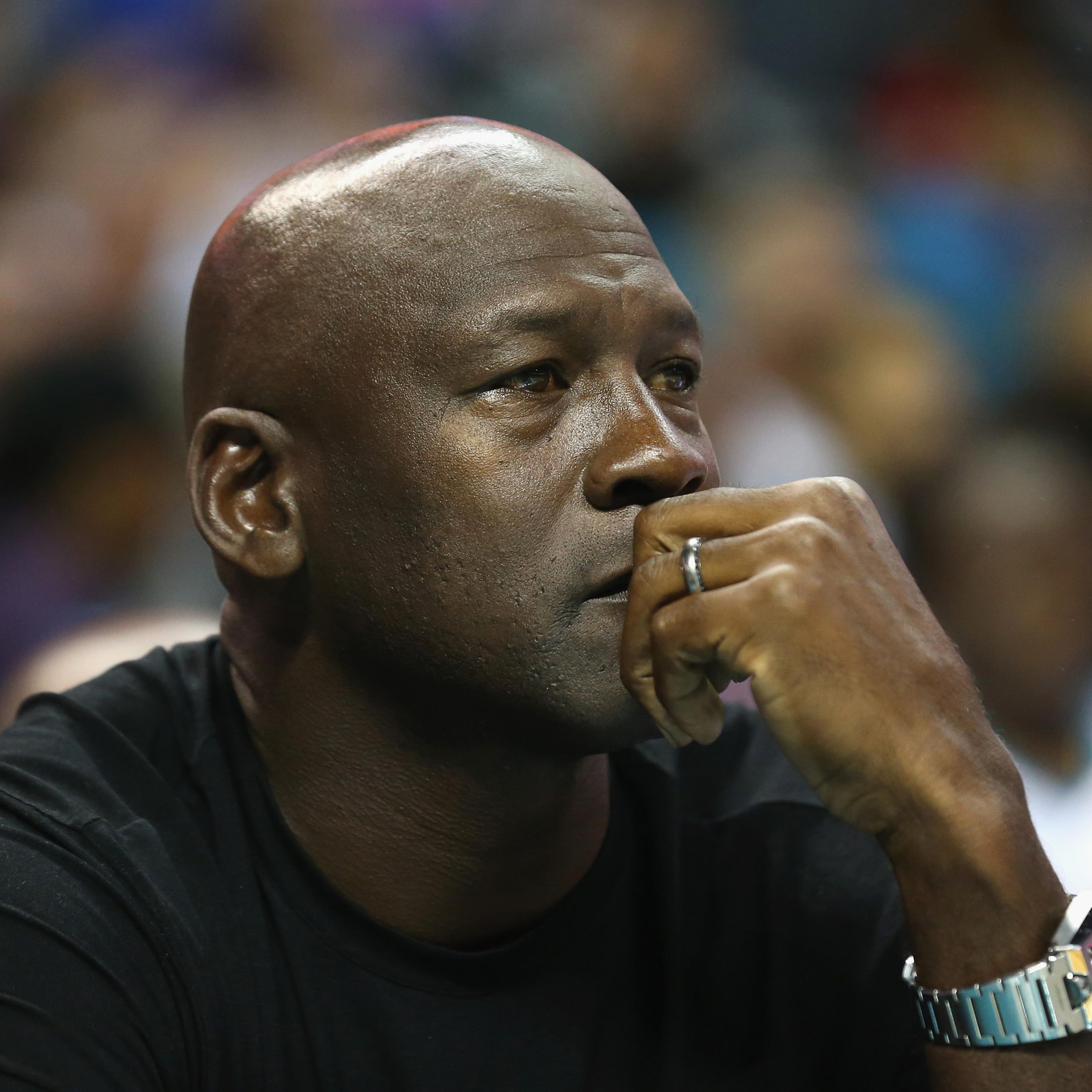 Owner of the Charlotte Hornets, Michael Jordan, watches on during their game against the Atlanta Hawks at Time Warner Cable Arena on in Charlotte on November 1, 2015.