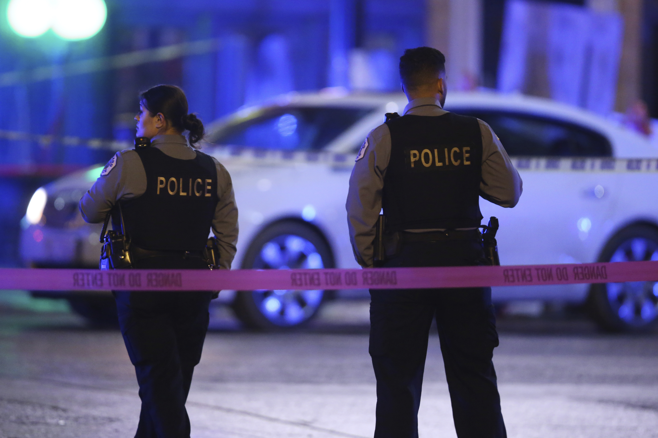 Police work the scene at North Lowell Ave and West Irving Park Road in Chicago