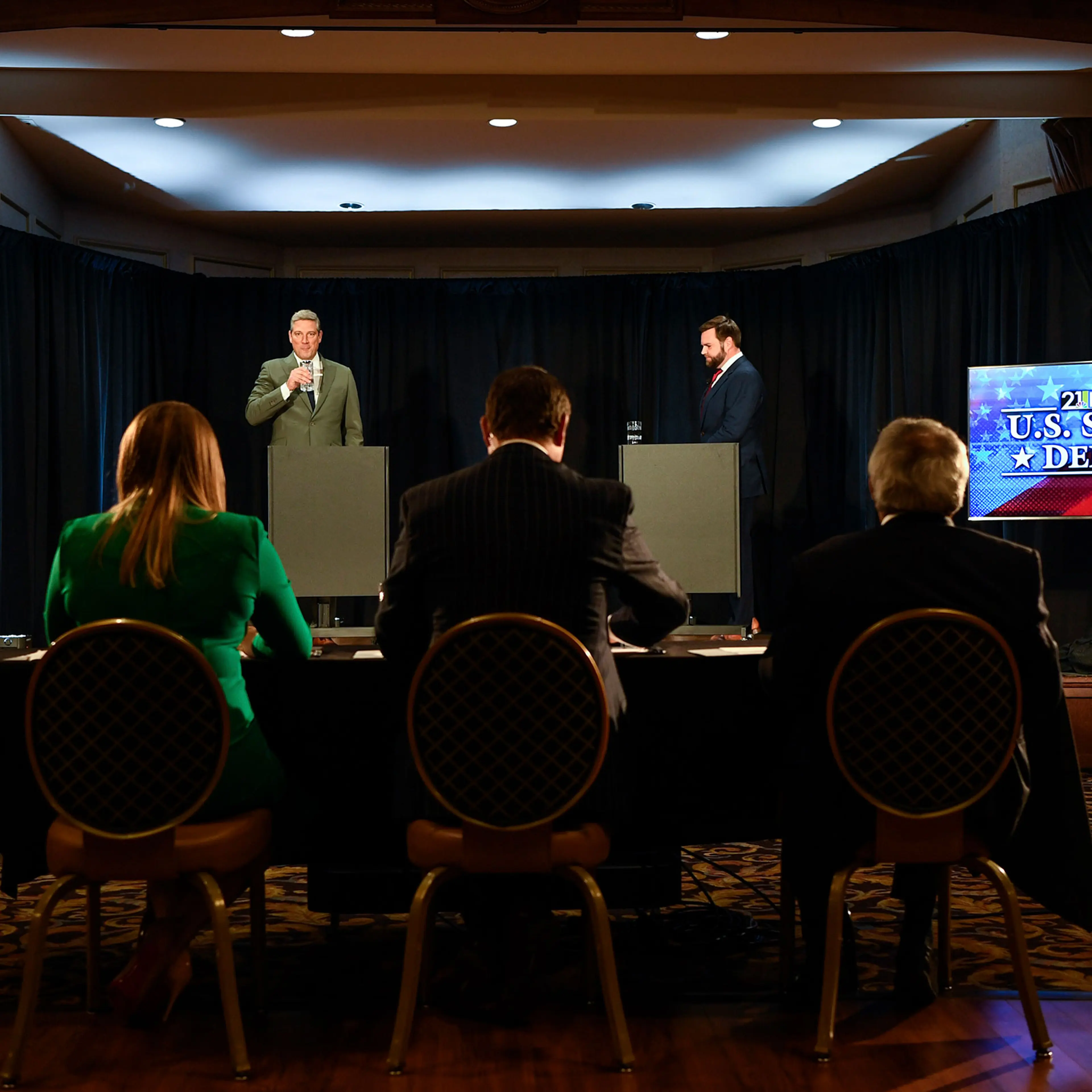 Senate candidates Rep. Tim Ryan (D-Ohio), left, and Republican JD Vance, await the start of their second debate in Youngstown, Ohio, on Monday, Oct. 17, 2022. (Gaelen Morse/The New York Times)
