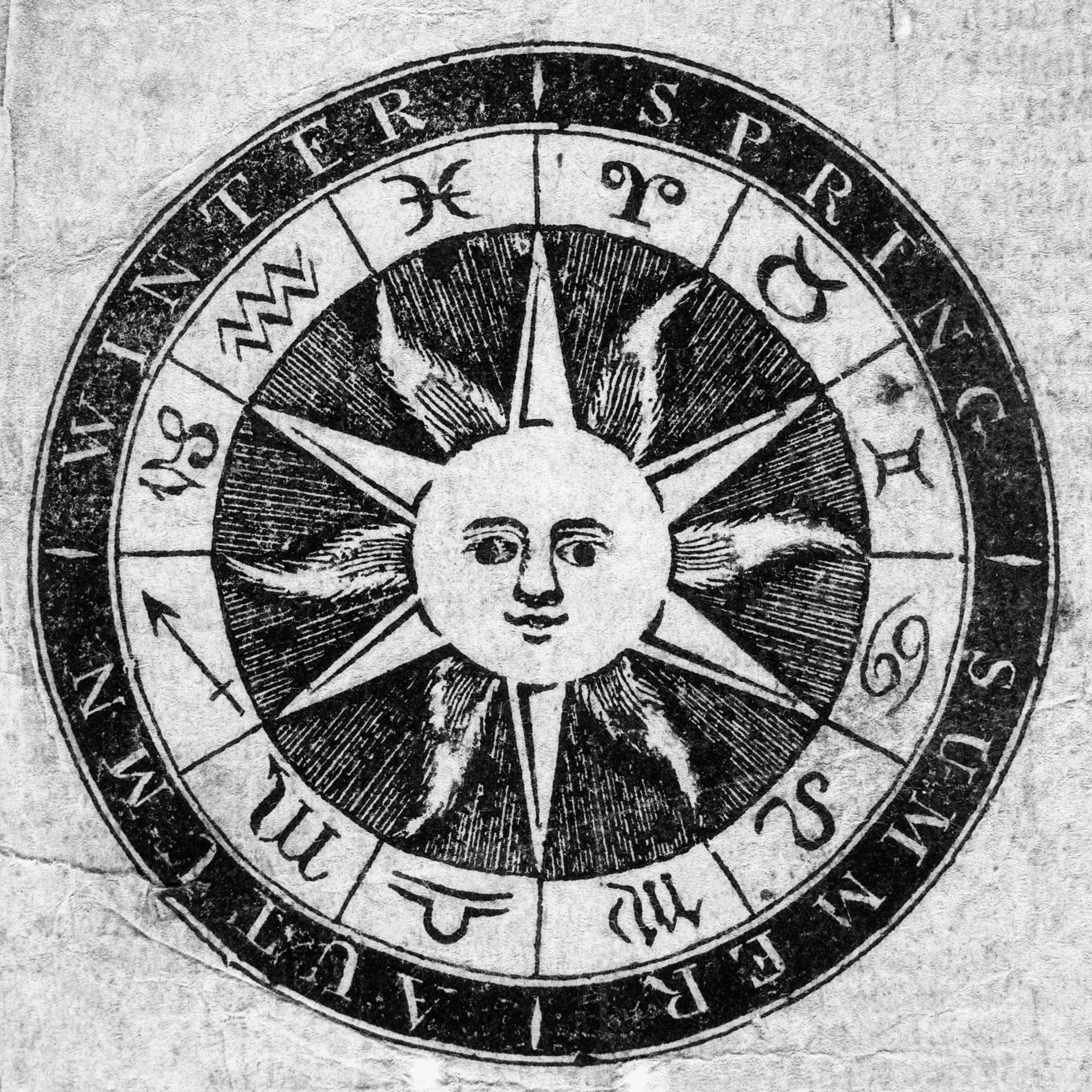 An image of the sun surrounded by a calendar showing seasons and the symbols of the zodiac that appear on the title page of an 1814 almanac written by Nathanael Low, M.D., and published by Munroe and Francis in Boston, Mass.