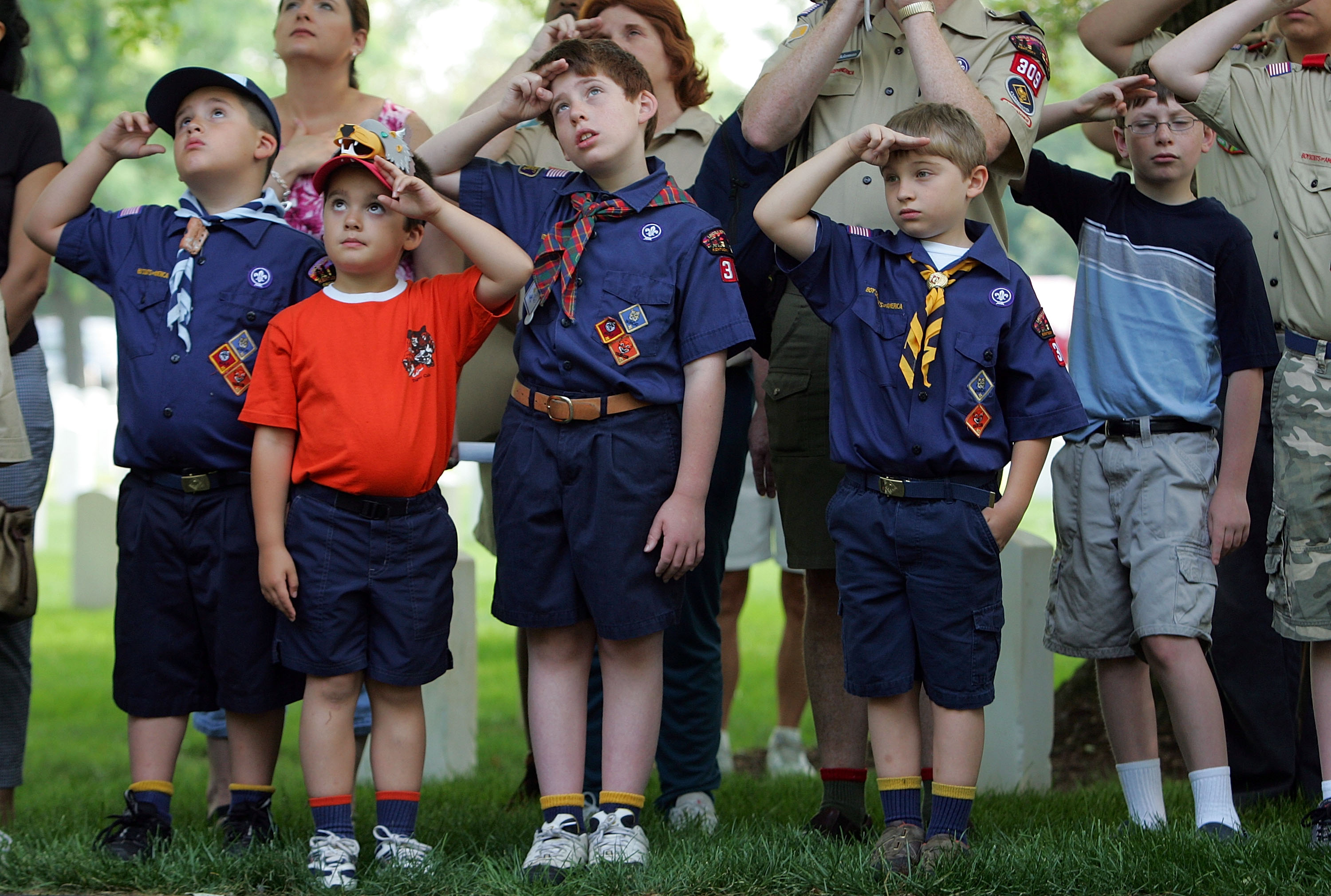 Boy Scouts Plant Flags At Cemetery For Memorial Day