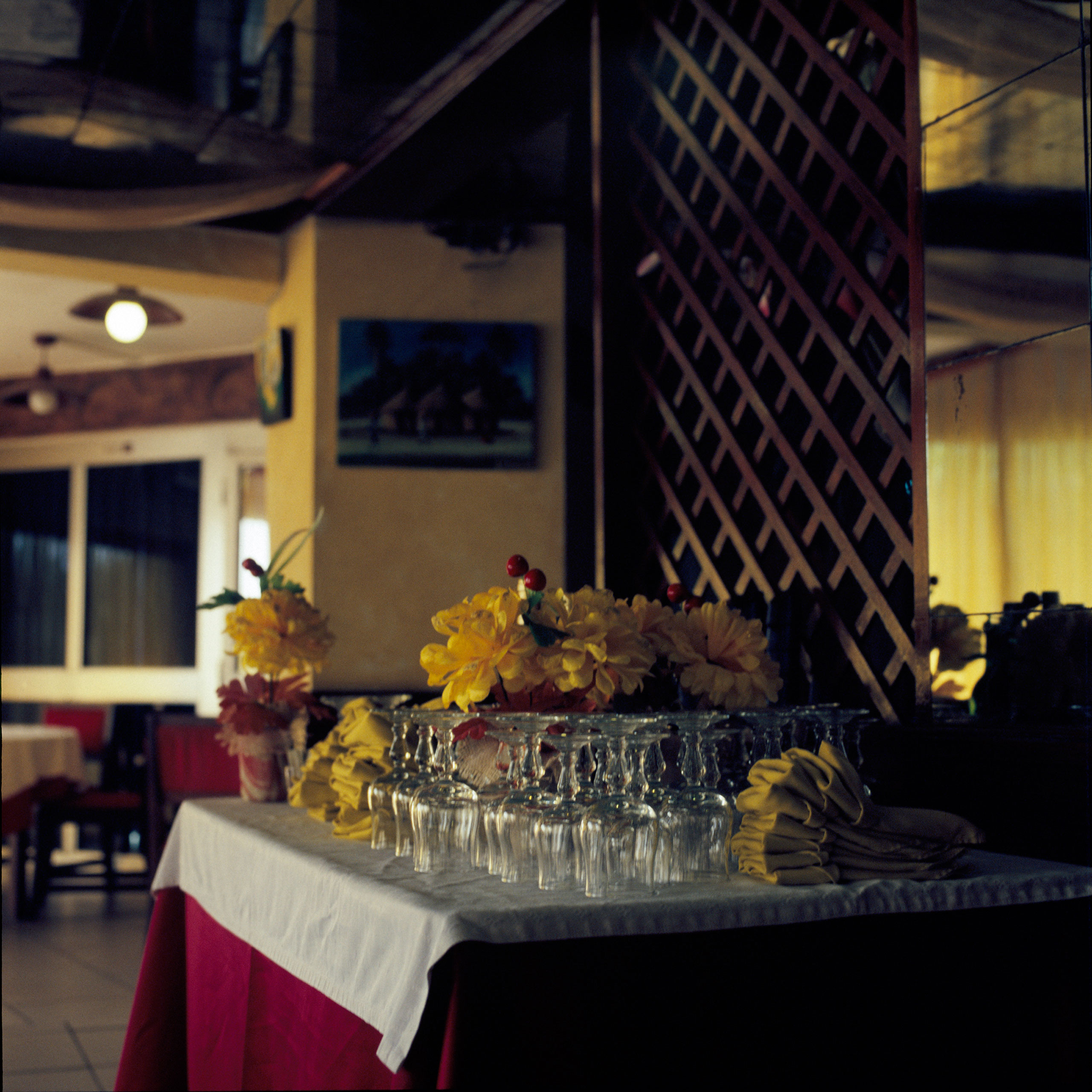 13-Mimi-Cherono-Ng-ok-Untitled-2014-restaurant-glasses-flowers-interior