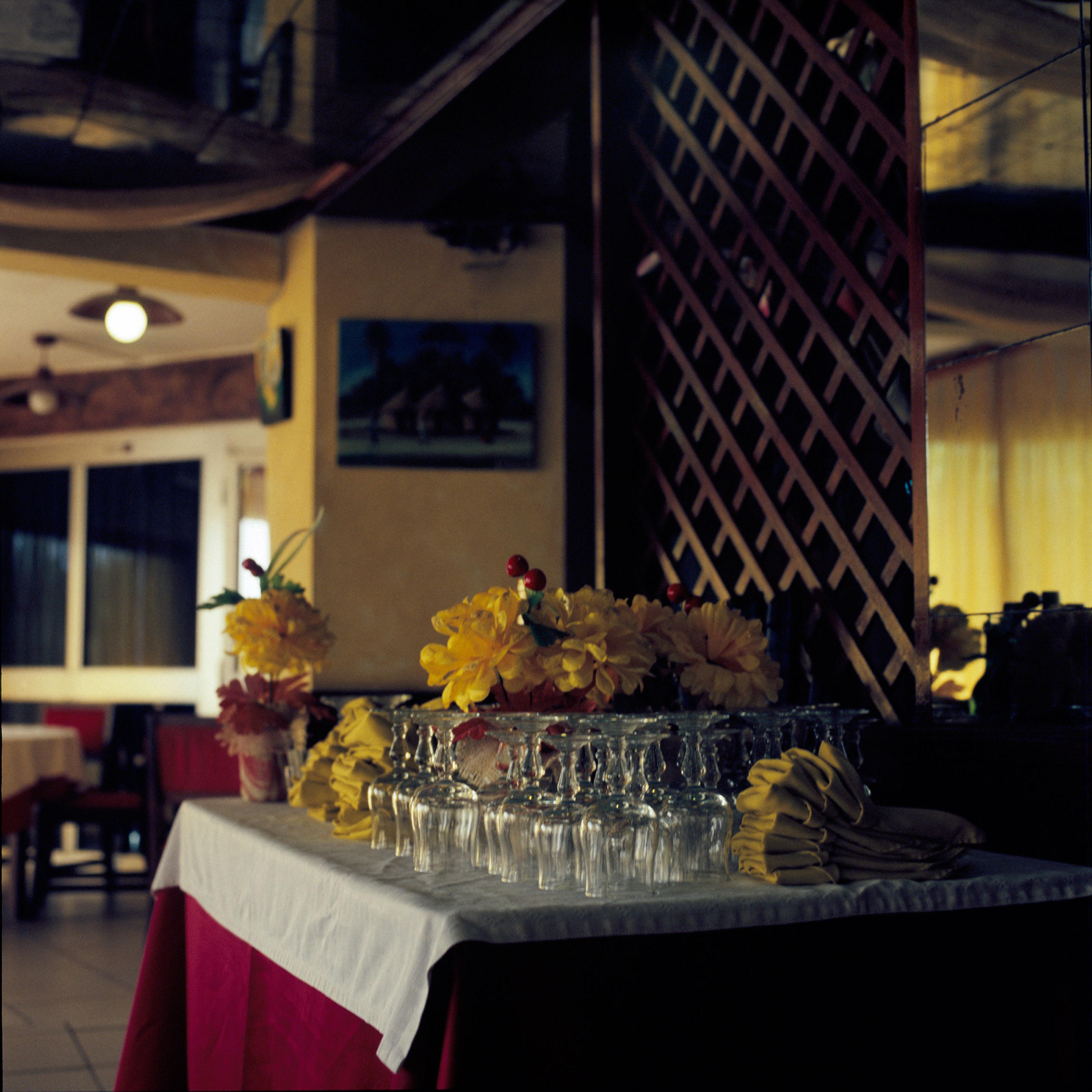 13-Mimi-Cherono-Ng-ok-Untitled-2014-restaurant-glasses-flowers-interior
