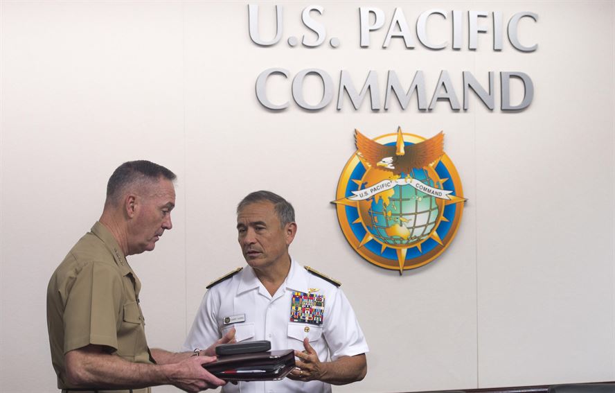 Marine General Joseph Dunford, left, meets last week in Hawaii with Admiral Harry Harris, chief of the U.S. Pacific Command.