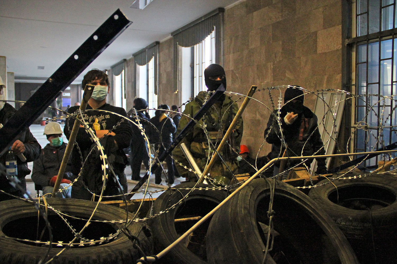 Activists prepare a barricade inside the regional administration building in Donetsk, Ukraine, April 7, 2014.
