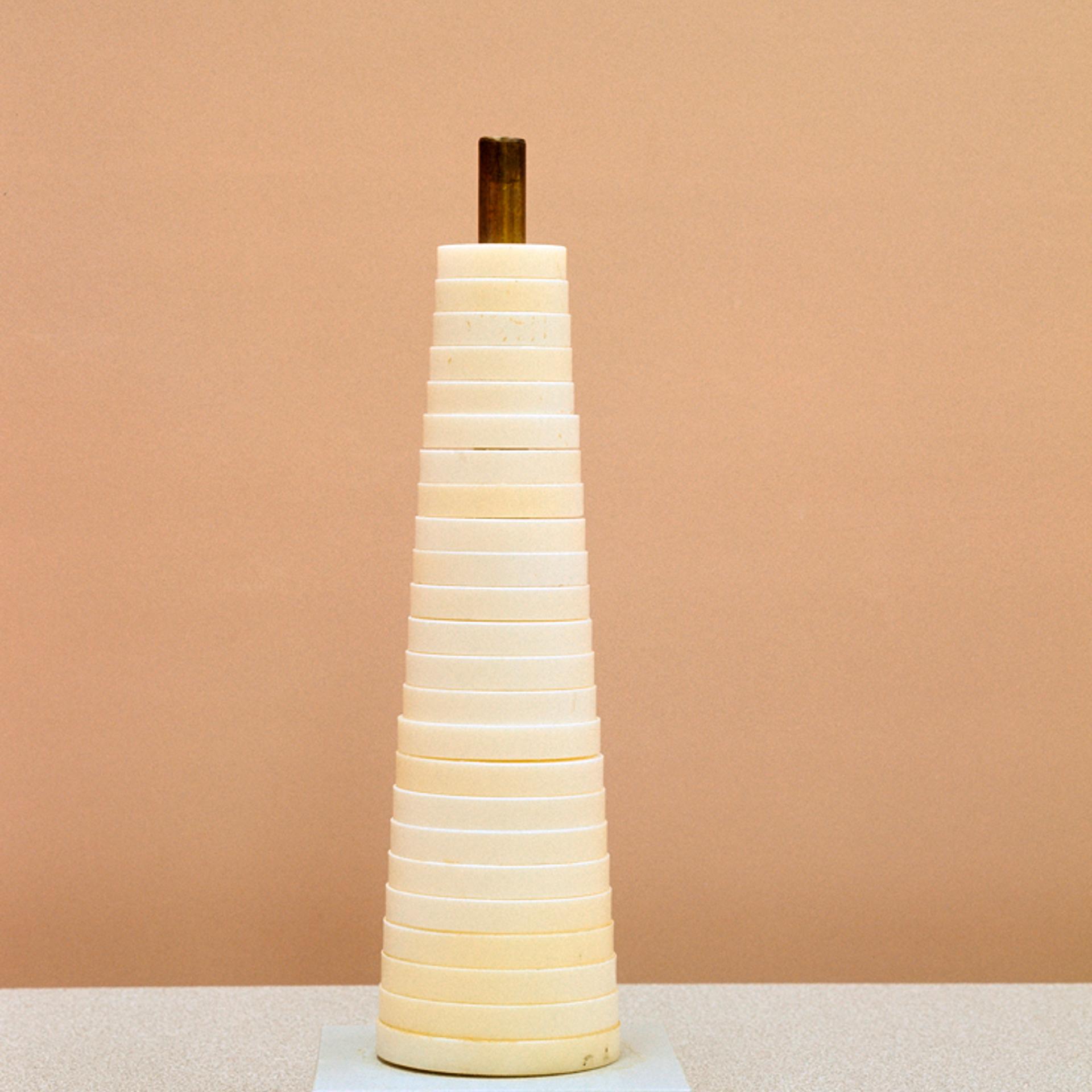 Circular calibration device, 2011<br><br>A device to calibrate instruments used to measure penile circumference. Consists of a 26-step plastic cylinder with steps ranging from 85 to 121 mm circumference.