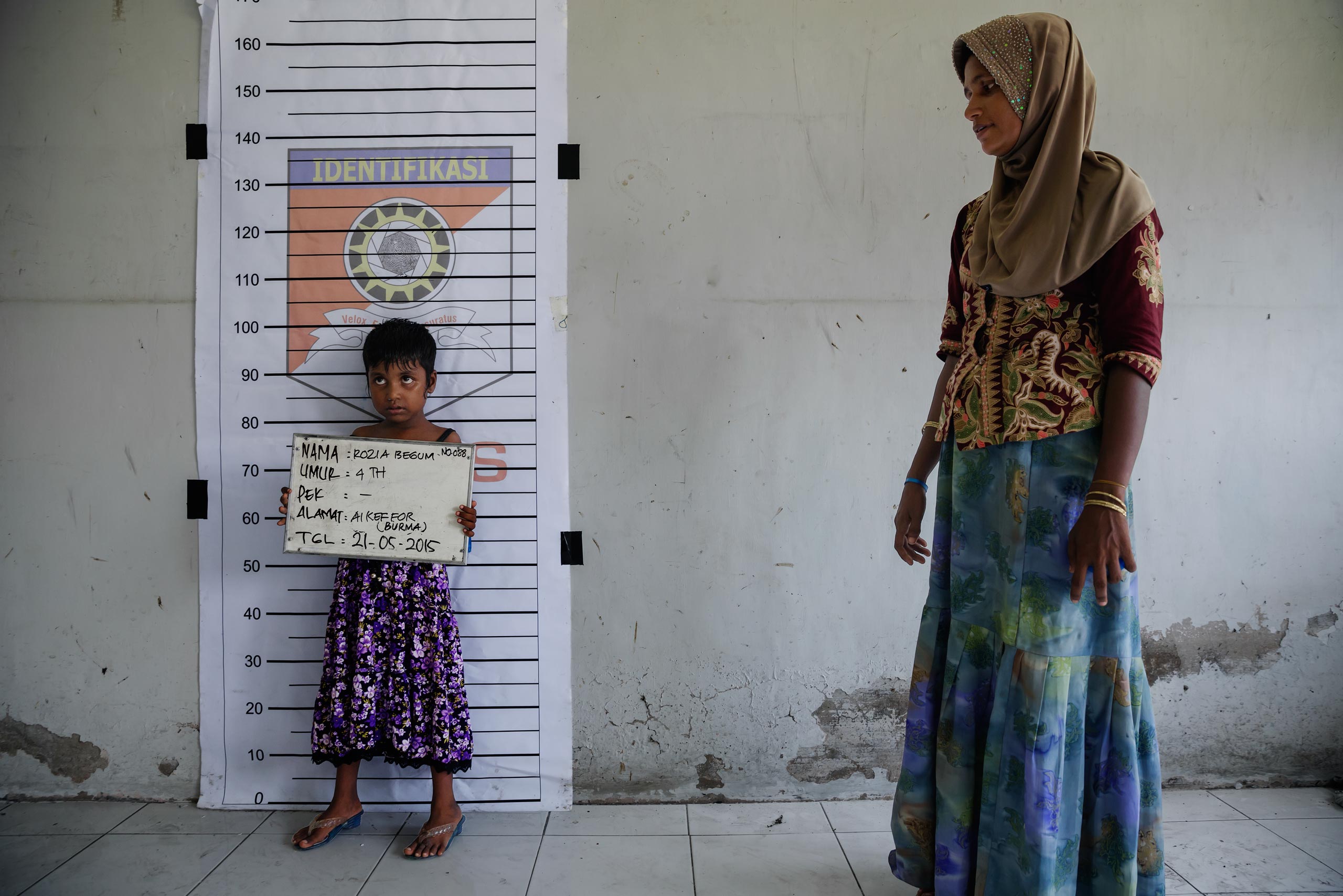 Rohingya and Bangladeshi refugees aboard boats that have been at sea for months off the coast of SE Asia. Landed in port pif Langsa in Aceh, Indonesia, where they were given shelter, food and medical care by Indonesian and international NGO's. The Rohing
