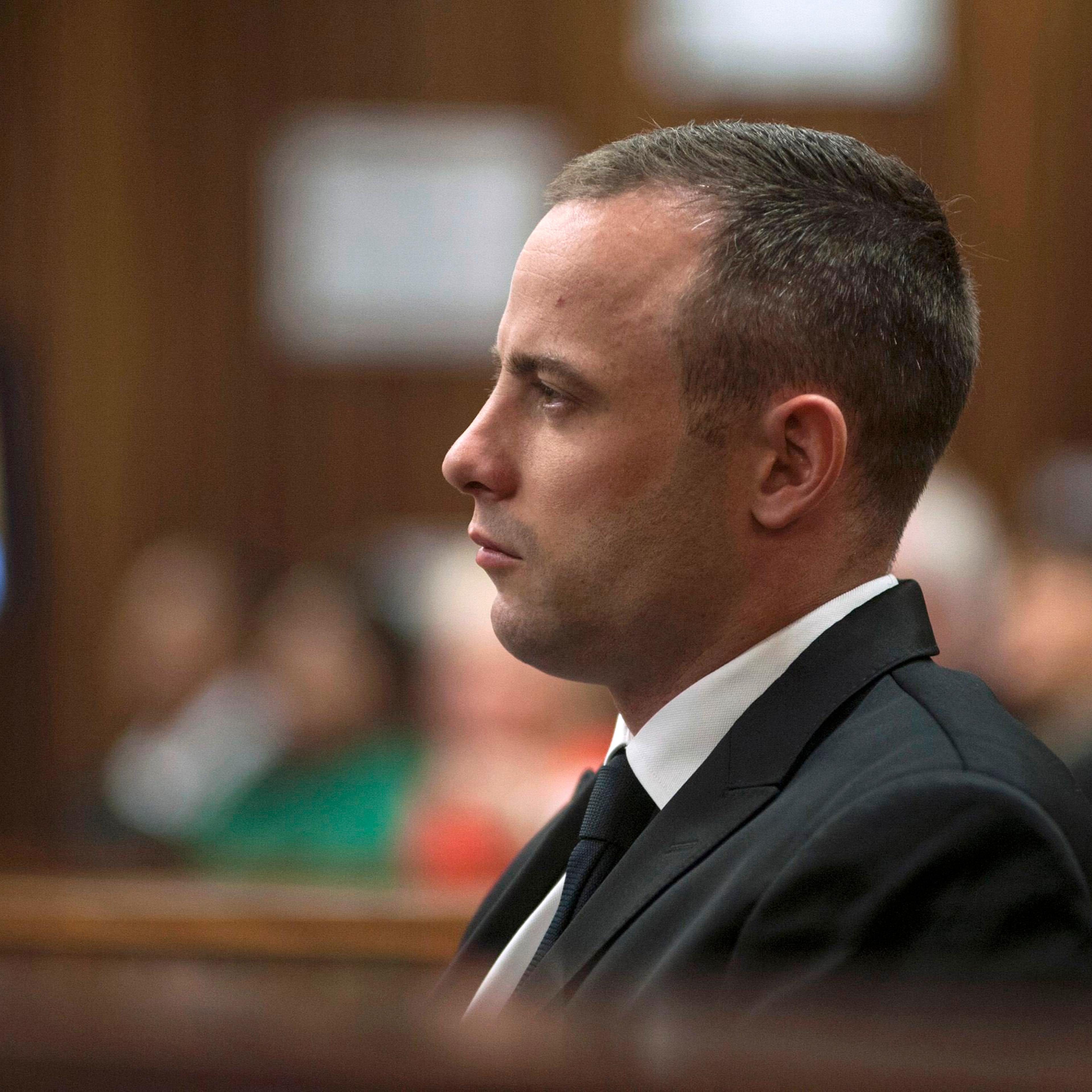 Olympic and Paralympic track star Oscar Pistorius sits in the dock in the North Gauteng High Court in Pretoria May 5, 2014.