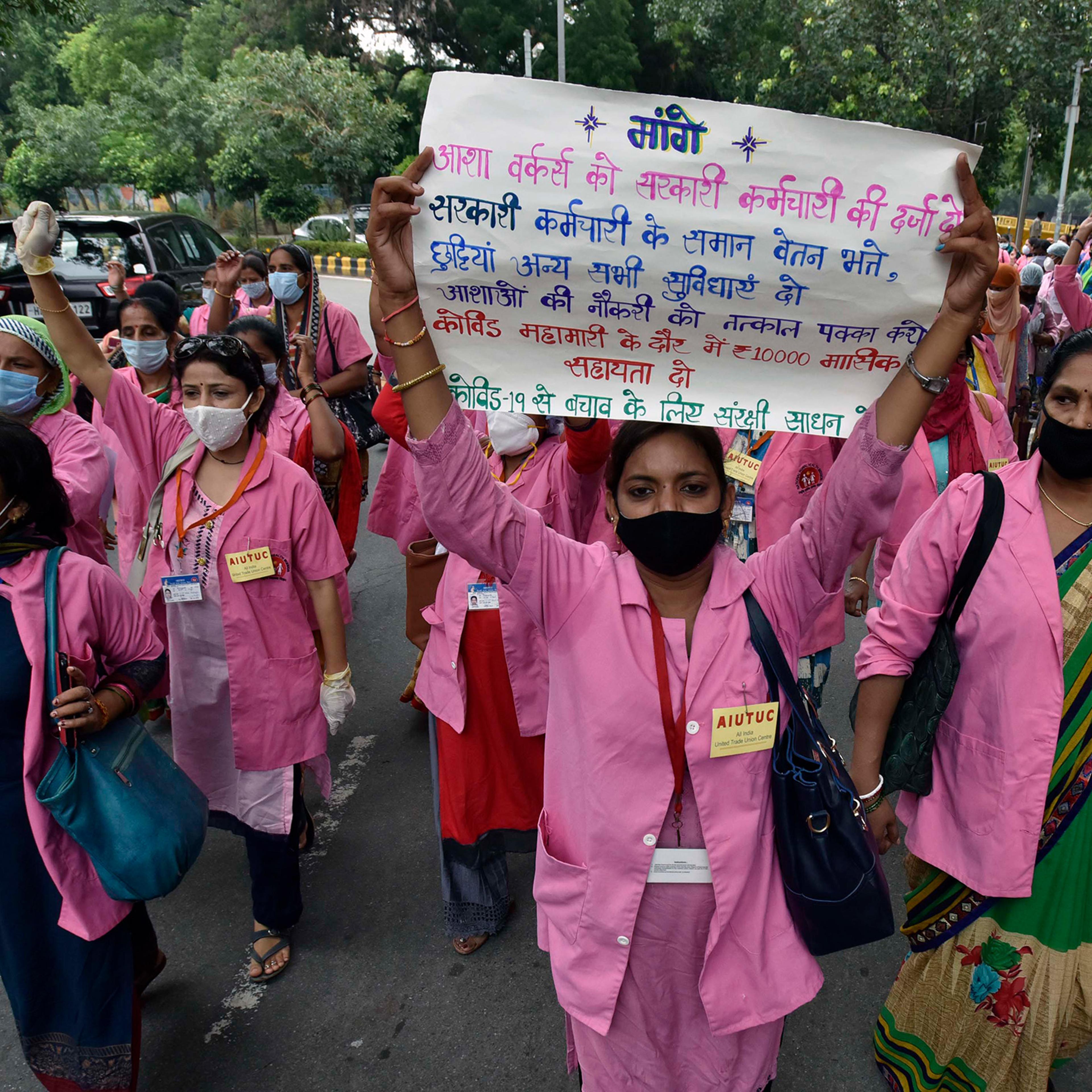 ASHA workers protest against alleged negligence of their workforce by the government on August 9, 2020 in New Delhi. During the protest, ASHA workers demanded payment for their work during the COVID-19 pandemic, saying they have not been paid for the pas
